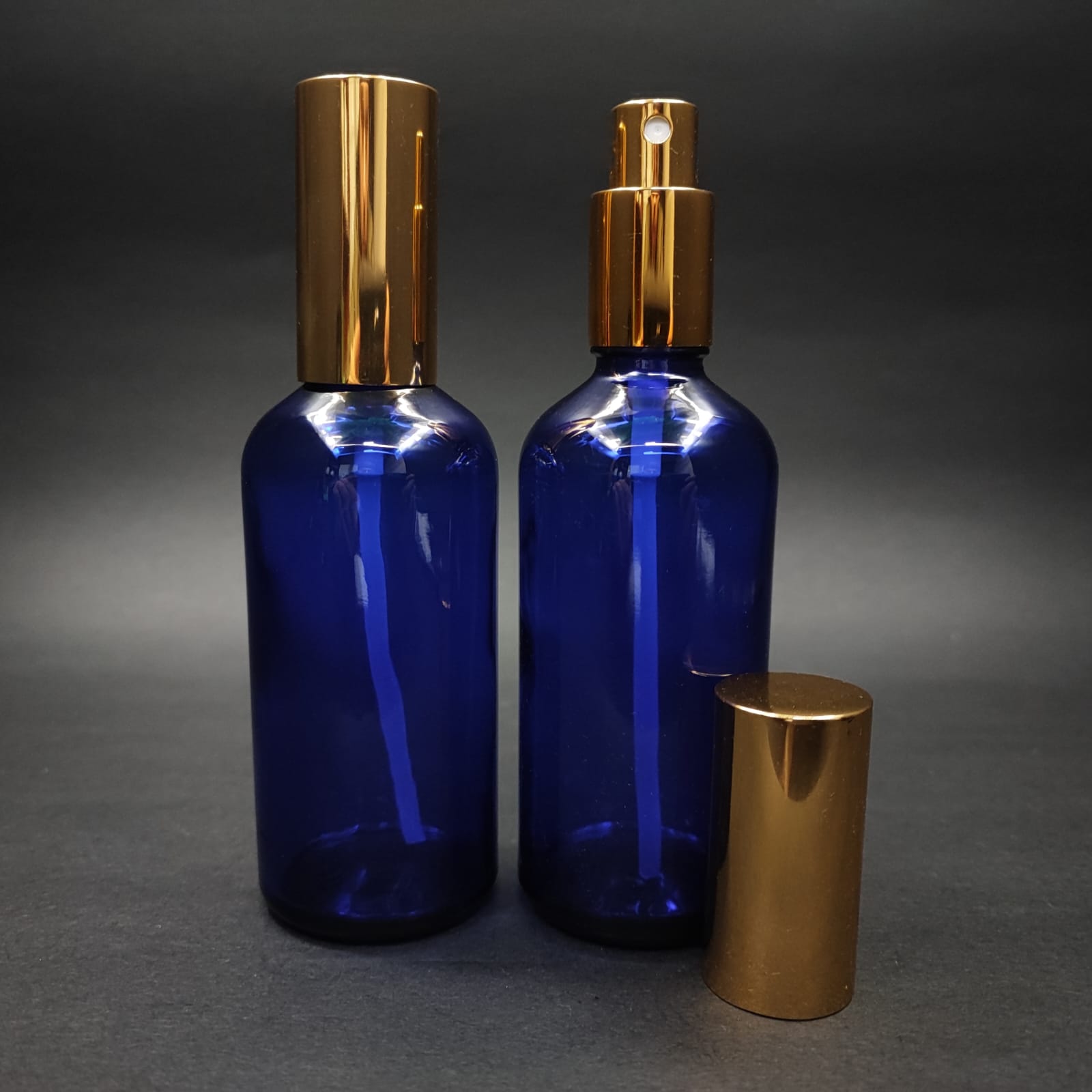 100 ML LÜKS VİDALI VALF ÇEVİRME PARFÜM ŞİŞELERİ - 100 CC MAVİ CAM ŞİŞE - GOLD METAL SPREYLİ KAPAKLI SET