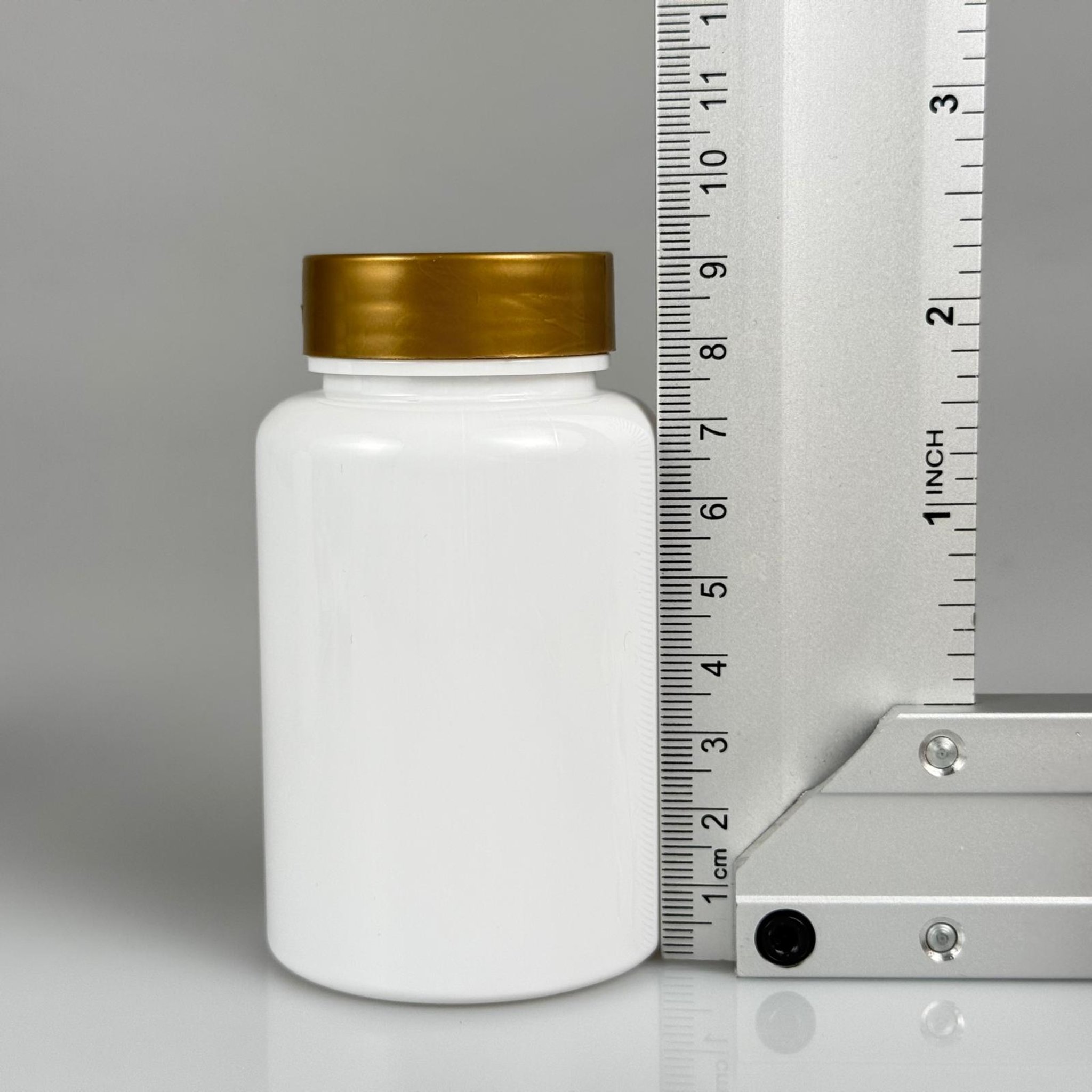 150 CC BEYAZ PET TABLET ŞİŞESİ - GOLD KAPAKLI + KENDİNDEN YAPIŞKANLI KÖPÜK CONTALI - 150 ML KAPSÜL KUTUSU - İLAÇ ŞİŞESİ - MEDİKAL HAP ŞİŞESİ - FARMASÖTİK KAVANOZ