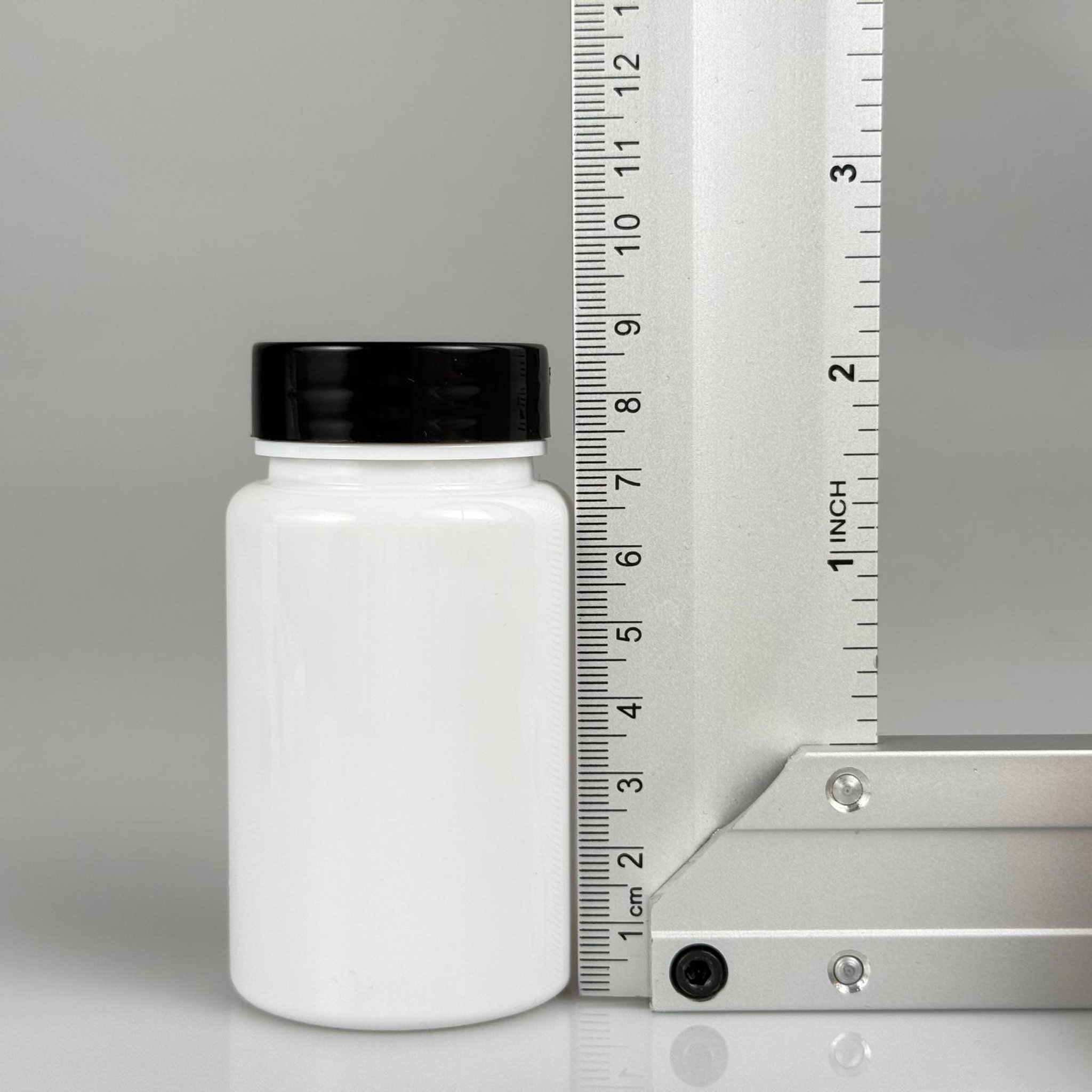 100 CC BEYAZ PET TABLET ŞİŞESİ - SİYAH KAPAKLI + KENDİNDEN YAPIŞKANLI KÖPÜK CONTALI - 100 ML KAPSÜL KUTUSU - İLAÇ ŞİŞESİ - MEDİKAL HAP ŞİŞESİ - FARMASÖTİK KAVANOZ