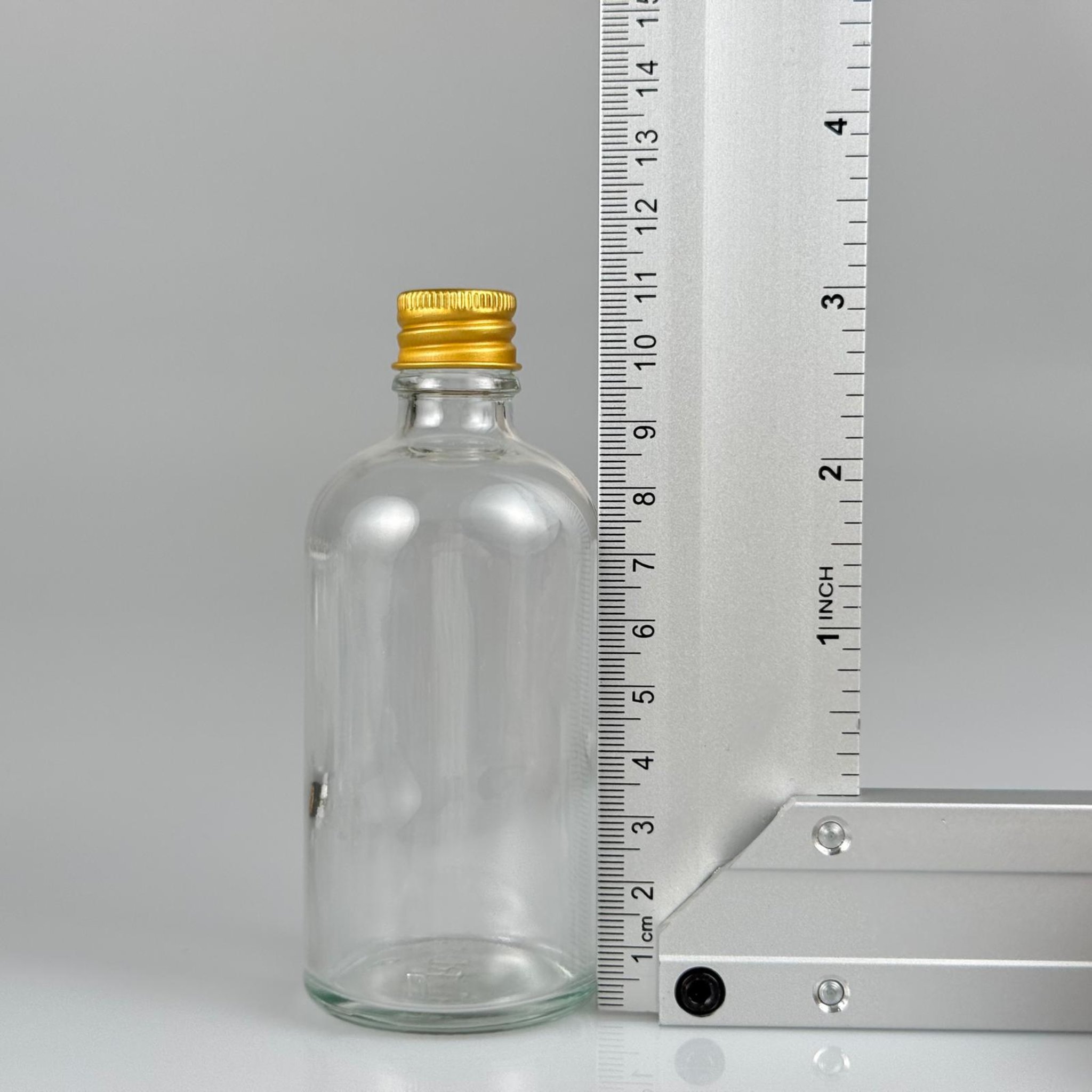 100 CC ŞEFFAF CAM ŞİŞE + KÖPÜK CONTALI GOLD ALÜMİNYUM METAL KAPAKLI + DAMLALIKLI KOLONYA TIPALI TAKIM - 100 ML ŞEFFAF CAM ŞİŞE