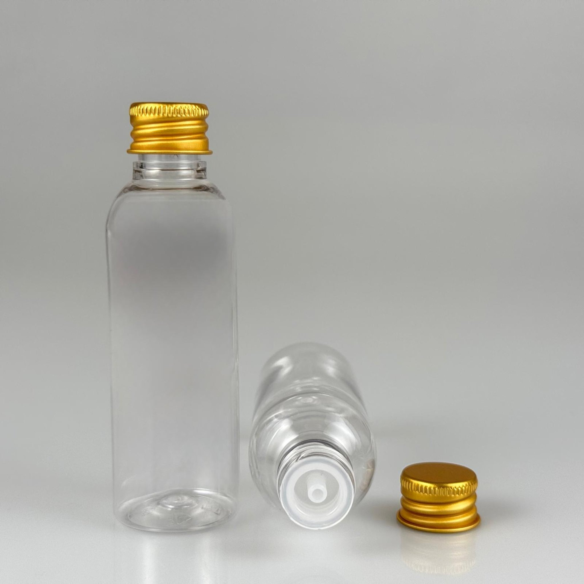 50 CC ŞEFFAF SİLİNDİR UZUN MODEL PET ŞİŞE + KÖPÜK CONTALI GOLD ALÜMİNYUM METAL KAPAKLI + DAMLALIKLI KOLONYA TIPALI TAKIM - 50 ML PLASTİK ŞİŞE