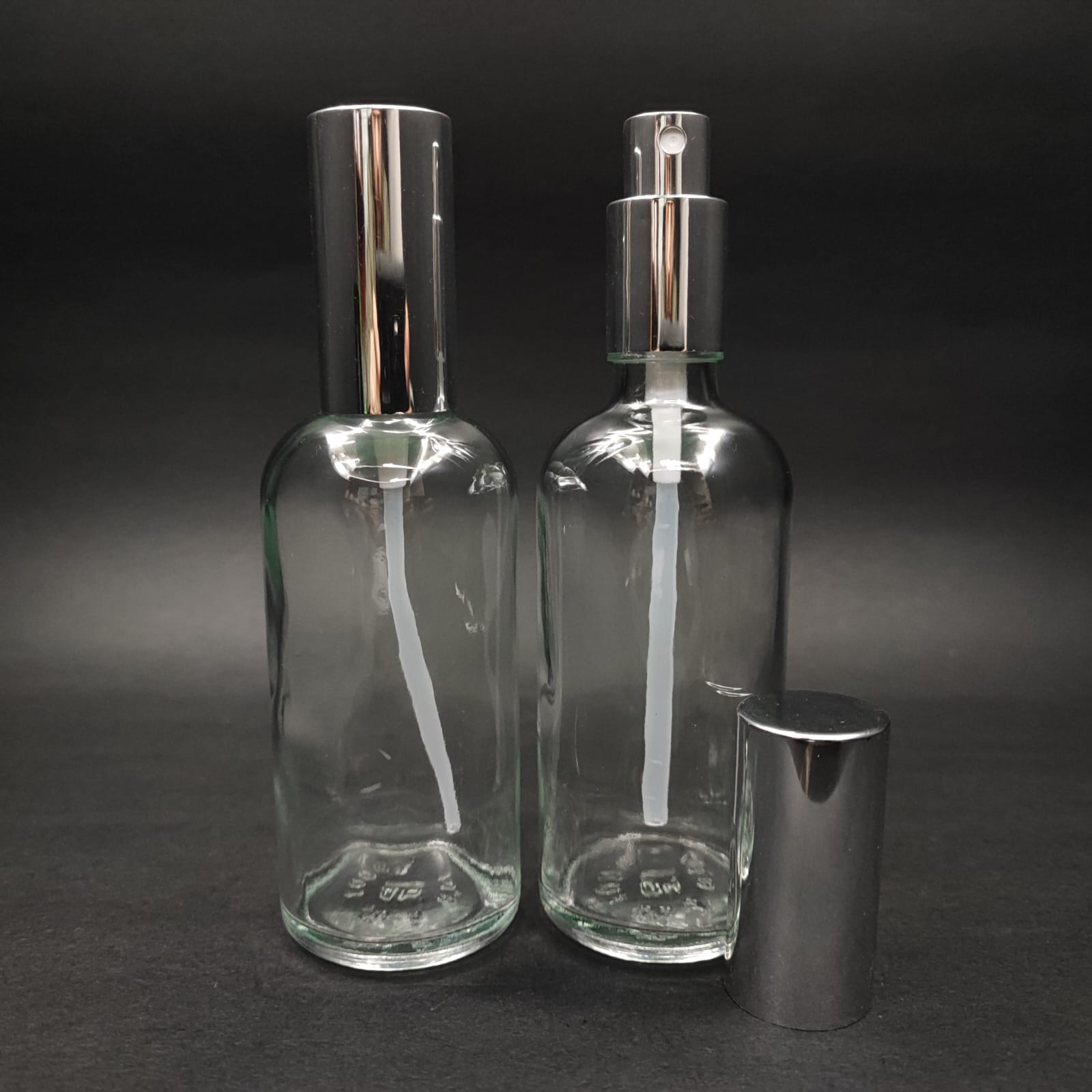 100 ML LÜKS VİDALI VALF ÇEVİRME PARFÜM ŞİŞELERİ - 100 CC ŞEFFAF CAM ŞİŞE - GÜMÜŞ METAL SPREYLİ KAPAKLI SET
