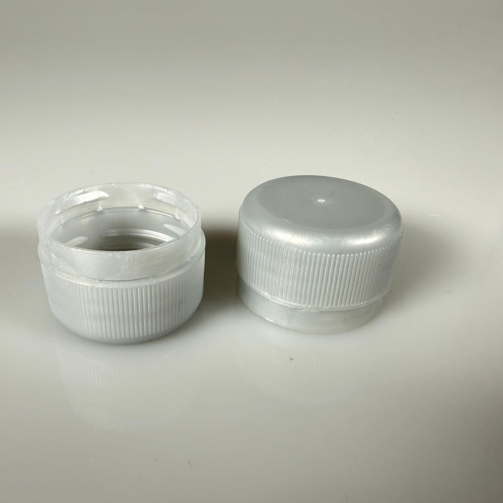 28 MM MEŞRUBAT KAPAĞI GÜMÜŞ - KOLA VE MEŞRUBAT ŞİŞELERİ İÇİN PLASTİK KAPAK - PCO UZUN ÇENE KAPAK DS28