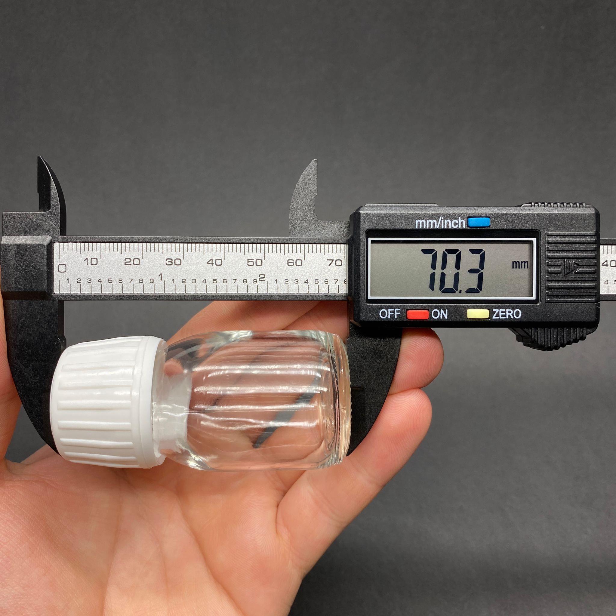 30 CC GENİŞ AĞIZLI ŞEFFAF CAM ŞİŞE - BEYAZ KİLİTLİ KAPAKLI - 30 ML CAM ŞİŞE - MİKROPLARDAN KORUNMASI İÇİN İLAÇLANMIŞTIR, SUYA TUTUNCA ŞEFFAF RENGİ ALIR