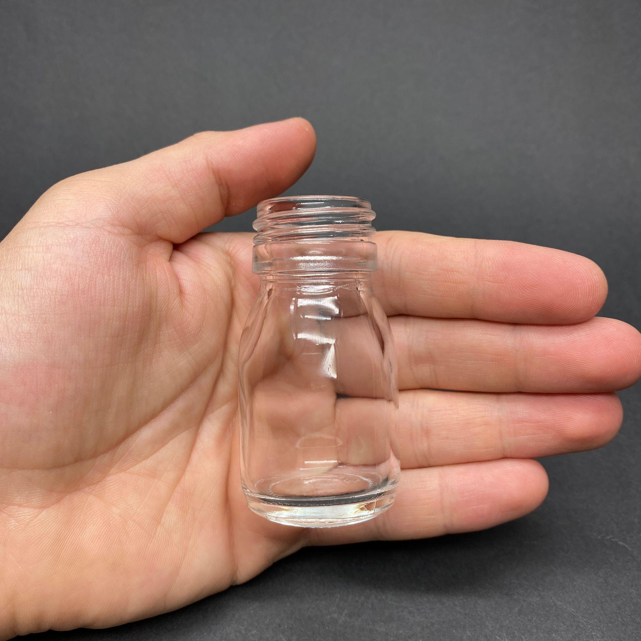 30 CC GENİŞ AĞIZLI ŞEFFAF CAM ŞİŞE KAPAKSIZ (28 AĞIZ) - 30 ML CAM ŞİŞE - MİKROPLARDAN KORUNMASI İÇİN İLAÇLANMIŞTIR, SUYA TUTUNCA ŞEFFAF RENGİ ALIR