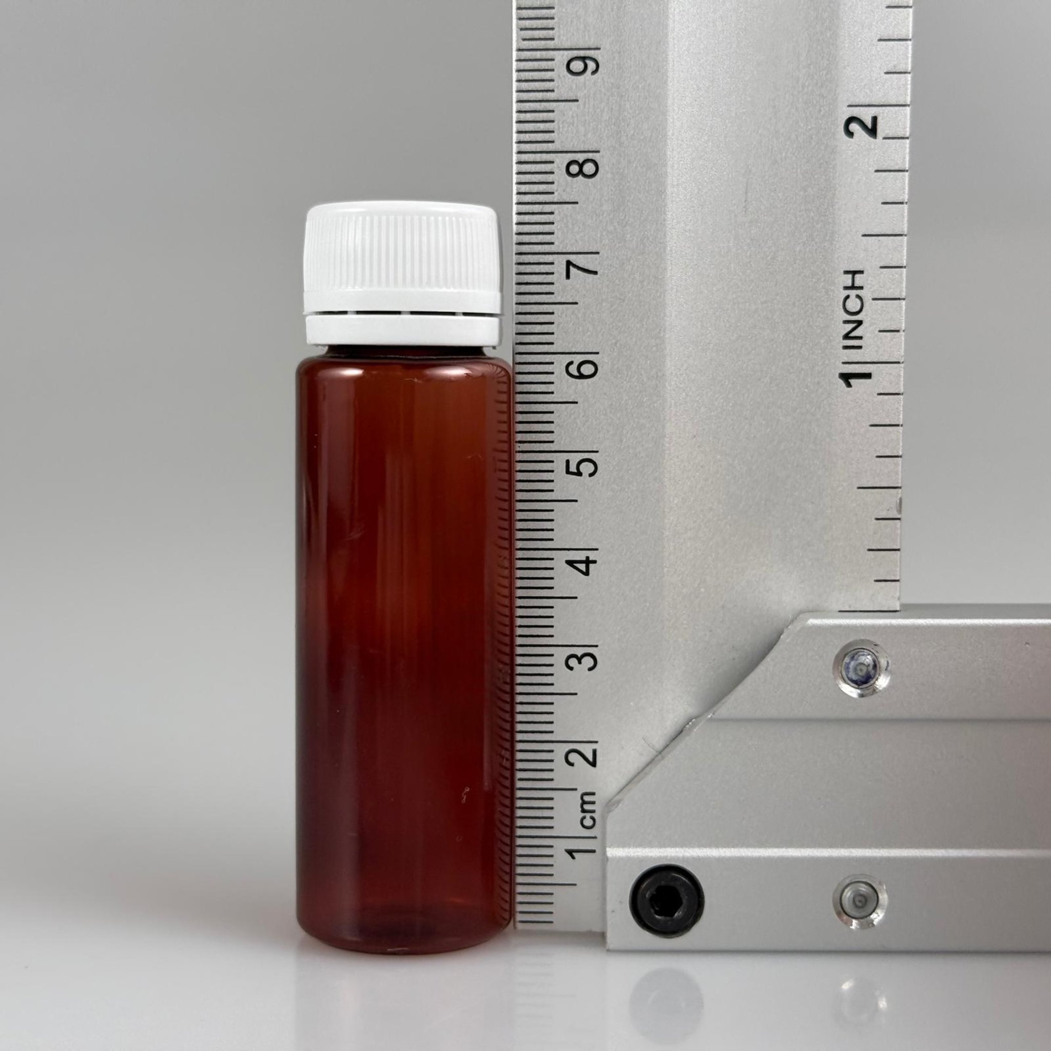 20 CC PET SHOT ŞİŞESİ  - KİLİTLİ BEYAZ KAPAKLI KOLAJEN ŞİŞESİ - 20 ML PLASTİK ŞİŞE - AMBER (KİLİTLİ KAPAK SERTÇE BASTIRARAK KAPANIR)