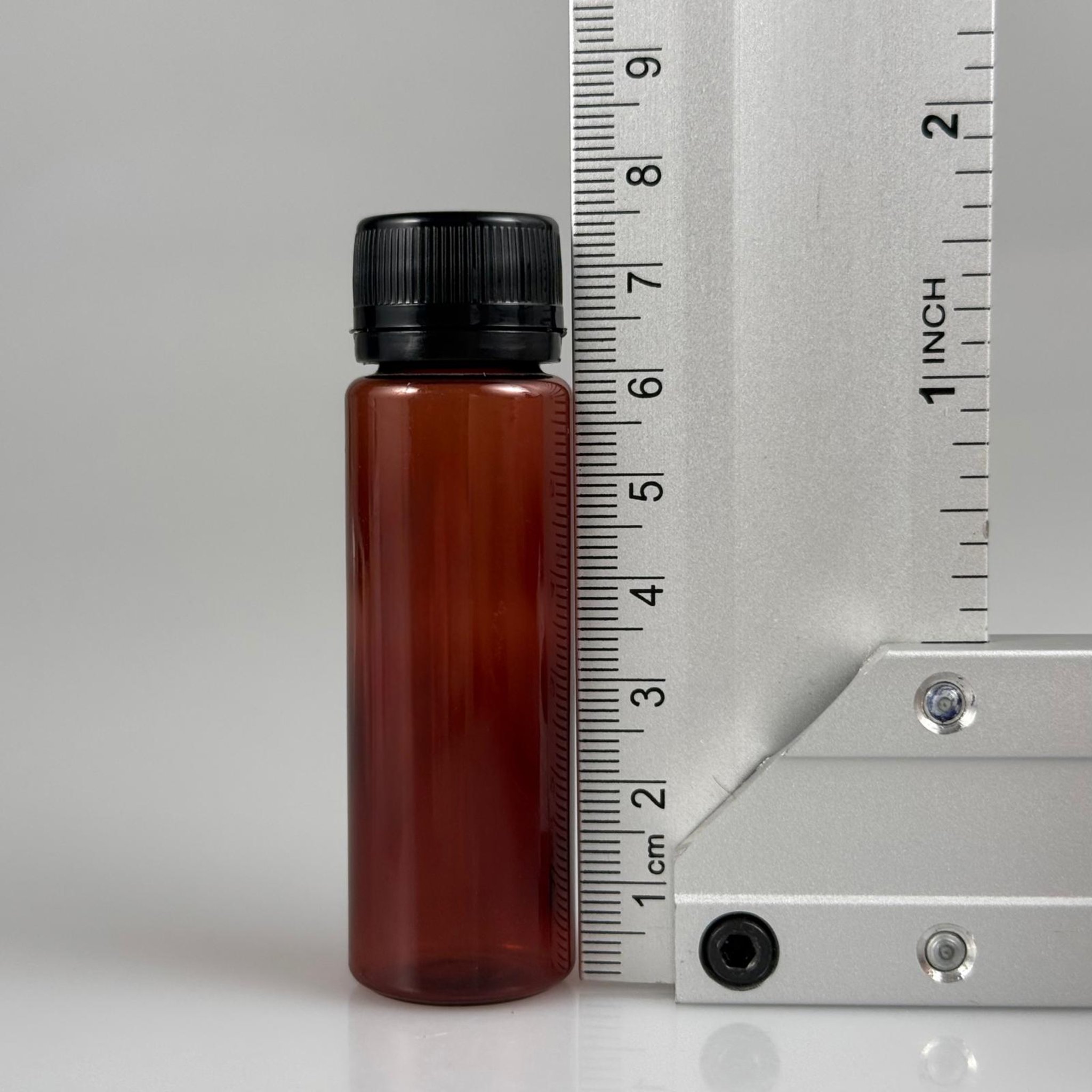 20 CC PET SHOT ŞİŞESİ  - KİLİTLİ SİYAH KAPAKLI KOLAJEN ŞİŞESİ - 20 ML PLASTİK ŞİŞE - AMBER (KİLİTLİ KAPAK SERTÇE BASTIRARAK KAPANIR)