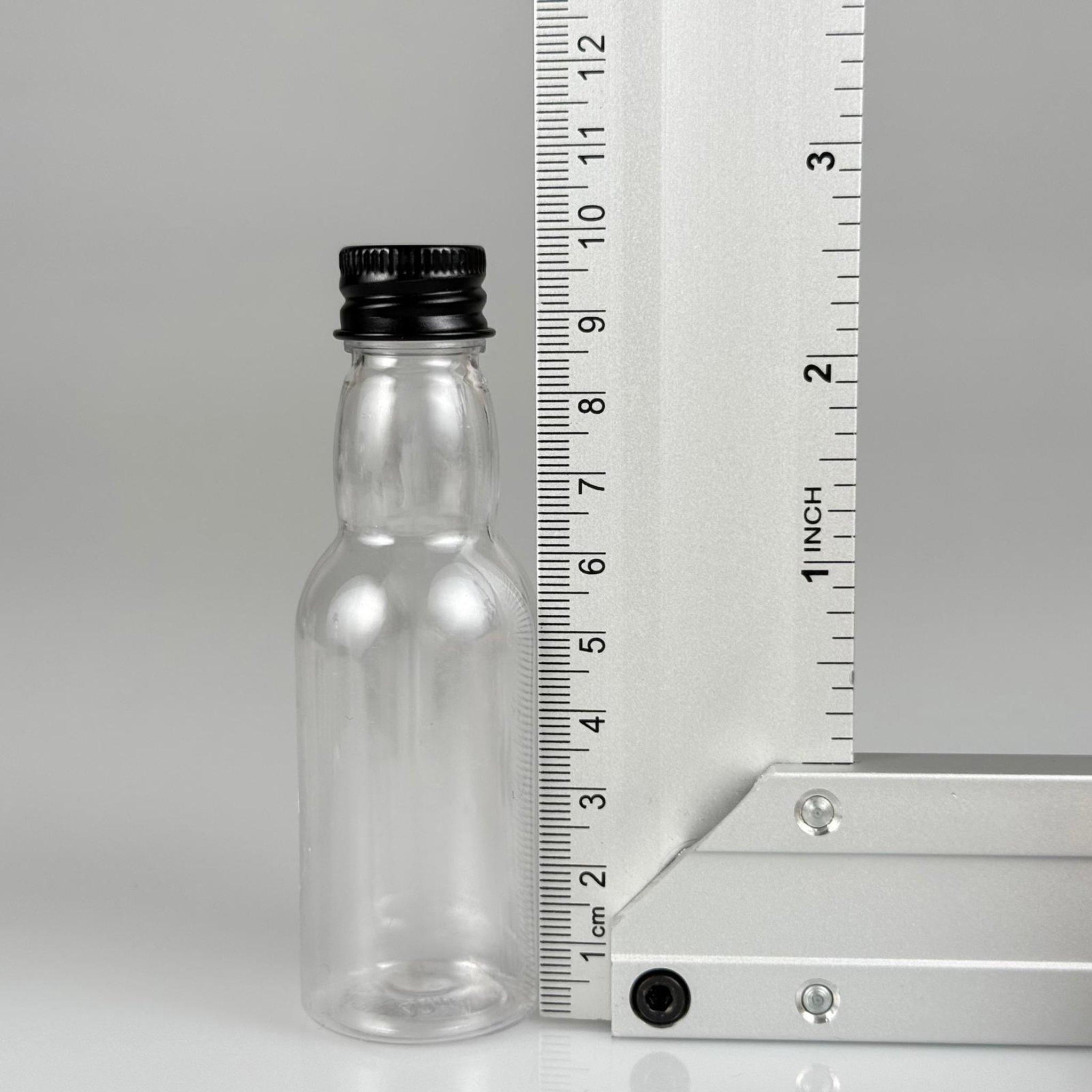 40 CC ŞEFFAF UZUN BOĞAZLI PET ŞİŞE + KÖPÜK CONTALI SİYAH ALÜMİNYUM METAL KAPAKLI + DAMLALIKLI KOLONYA TIPALI TAKIM - 40 ML BOĞAZLI PET ŞİŞE