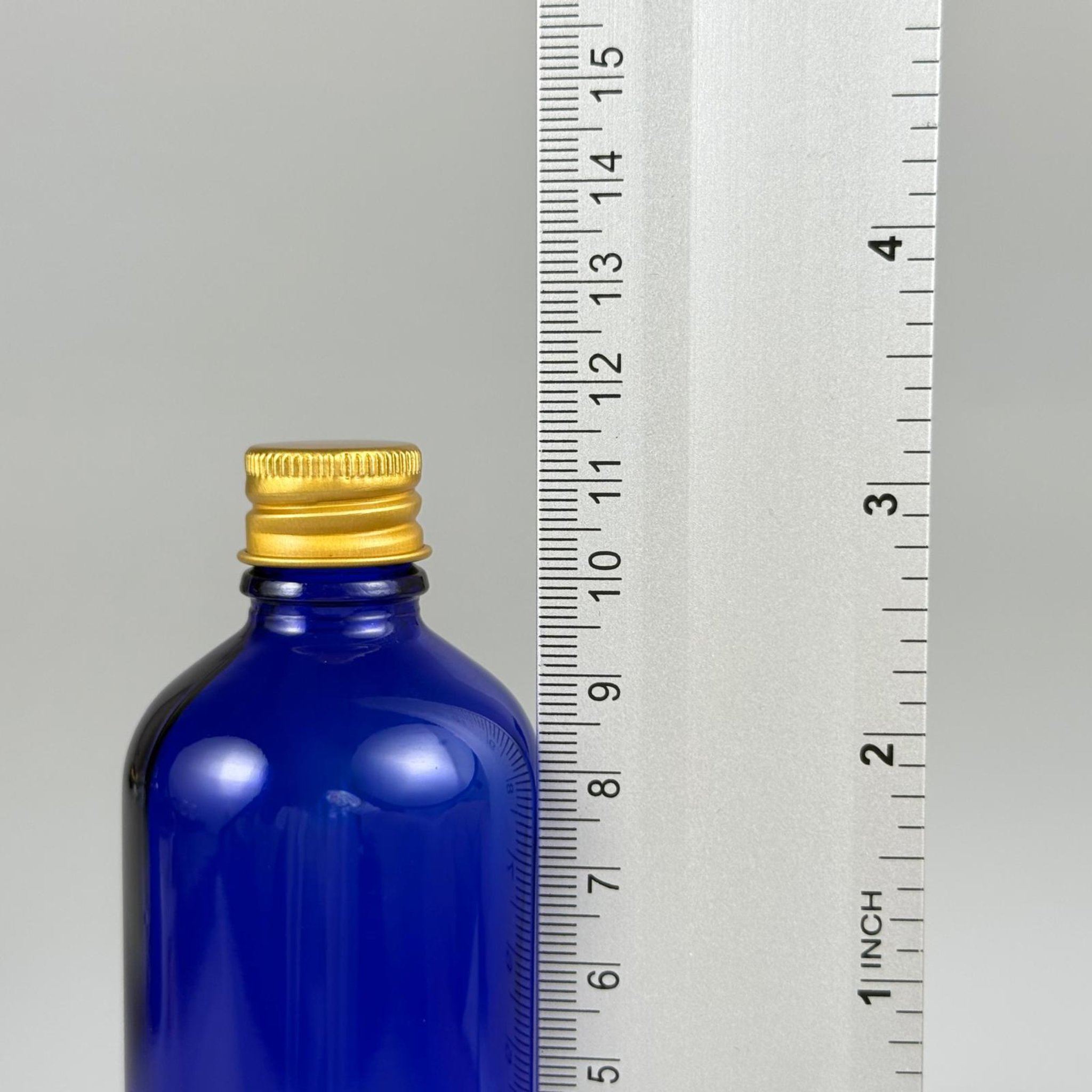 100 CC MAVİ CAM ŞİŞE + KÖPÜK CONTALI GOLD ALÜMİNYUM METAL + DAMLALIKLI KOLONYA TIPALI KAPAKLI TAKIM - 100 ML MAVİ CAM ŞİŞE