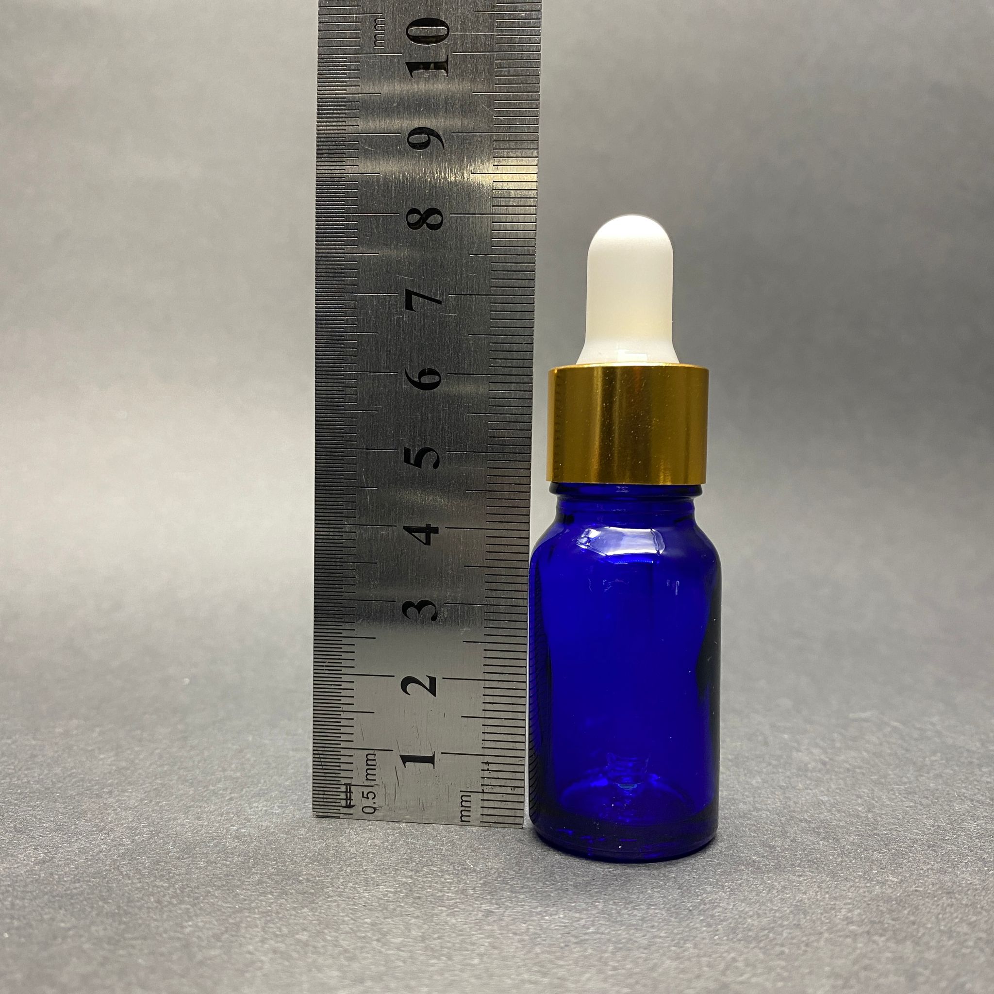 10 CC MAVİ CAM DAMLALIKLI ŞİŞE - BEYAZ EMZİK - GOLD METALİK KAPAK - 10 ML MAVİ CAM DAMLALIKLI ŞİŞE