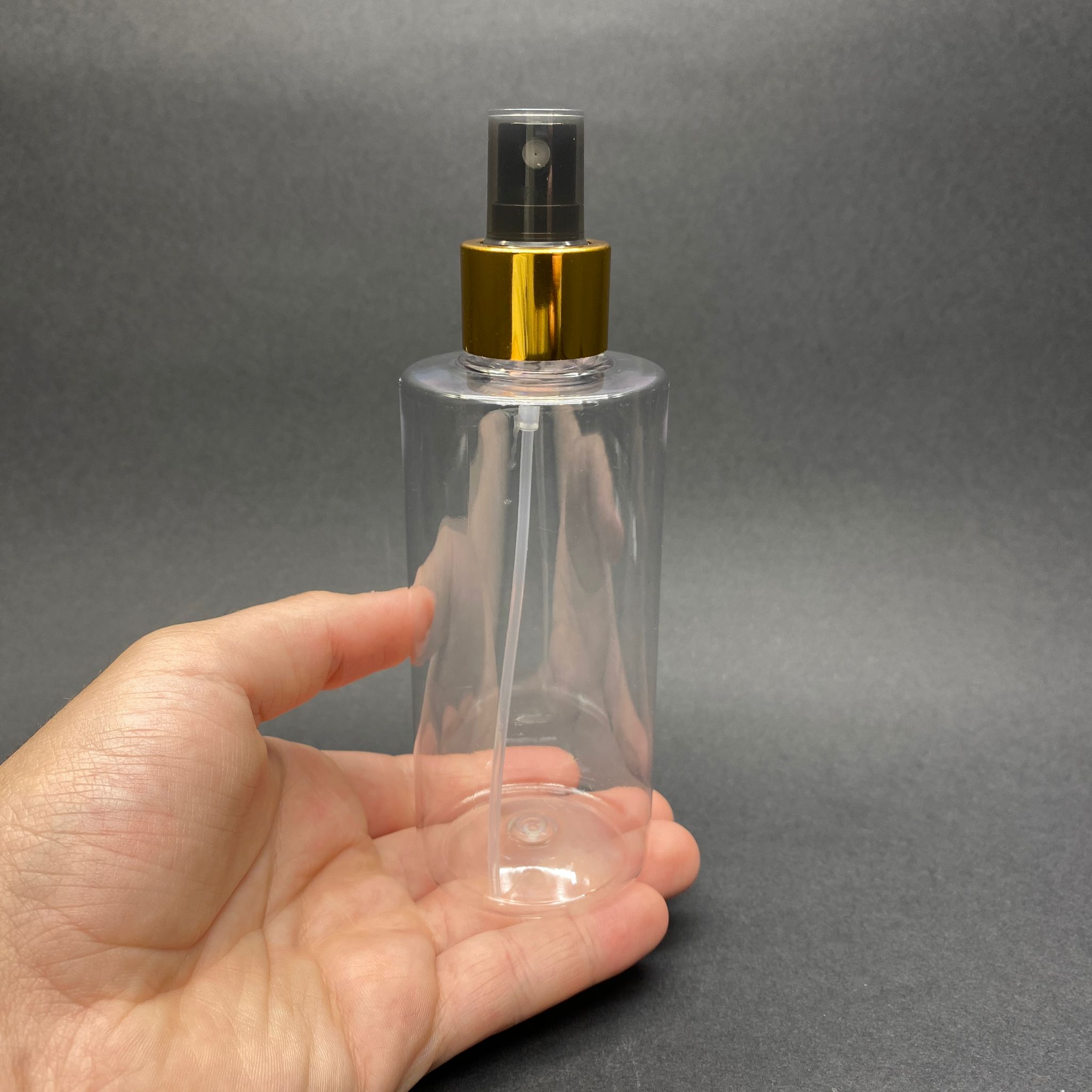 200 CC SİLİNDİR KESKİN KÜT MODEL SERT (25 GR) PET ŞİŞE - GOLD METALİK SPREYLİ - AĞIZ ÇAPI 24 MM - ŞEFFAF