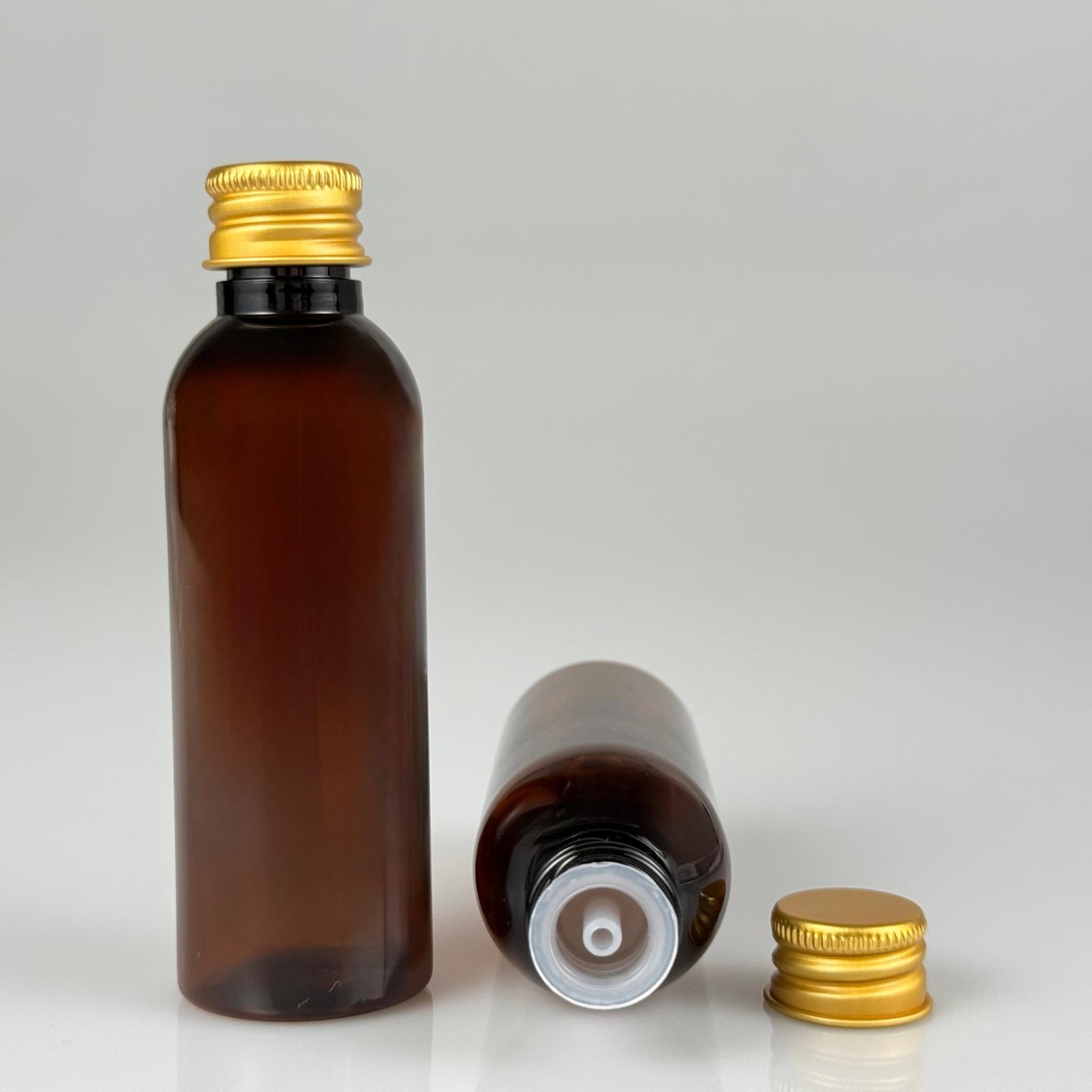 50 CC AMBER SİLİNDİR UZUN MODEL PET ŞİŞE + KÖPÜK CONTALI GOLD ALÜMİNYUM METAL KAPAKLI + DAMLALIKLI KOLONYA TIPALI TAKIM - 50 ML KAHVERENGİ PLASTİK ŞİŞE