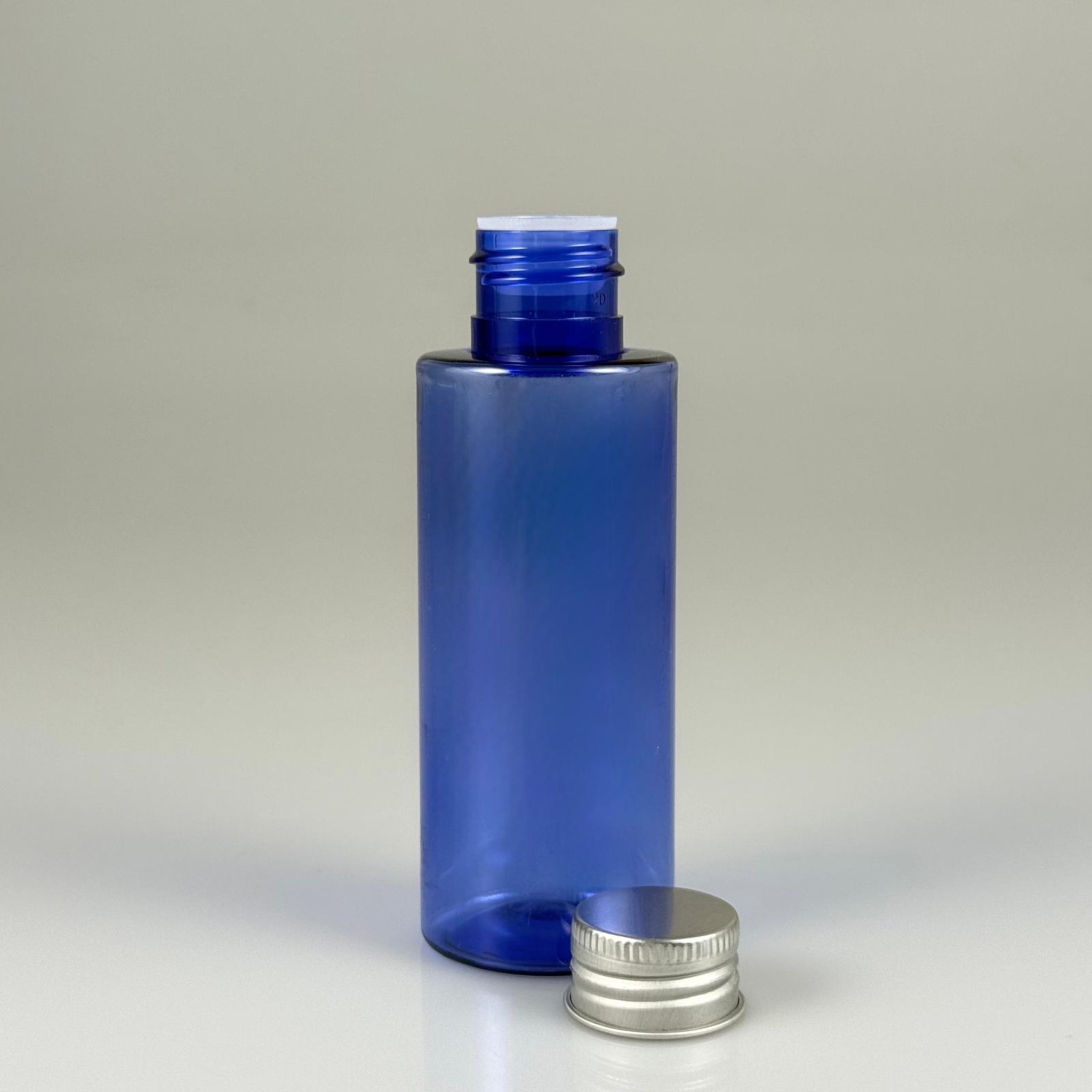 100 CC MAVİ SİLİNDİR KESKİN KÜT MODEL SERT PET ŞİŞE (17 GR - 24 AĞIZ ) + KÖPÜK COMTALI GÜMÜŞ METAL ALÜMİNYUM KAPAK + KOLONYTA TIPALI TAKIM - 100 ML KAPAKLI MAVİ PET ŞİŞELER