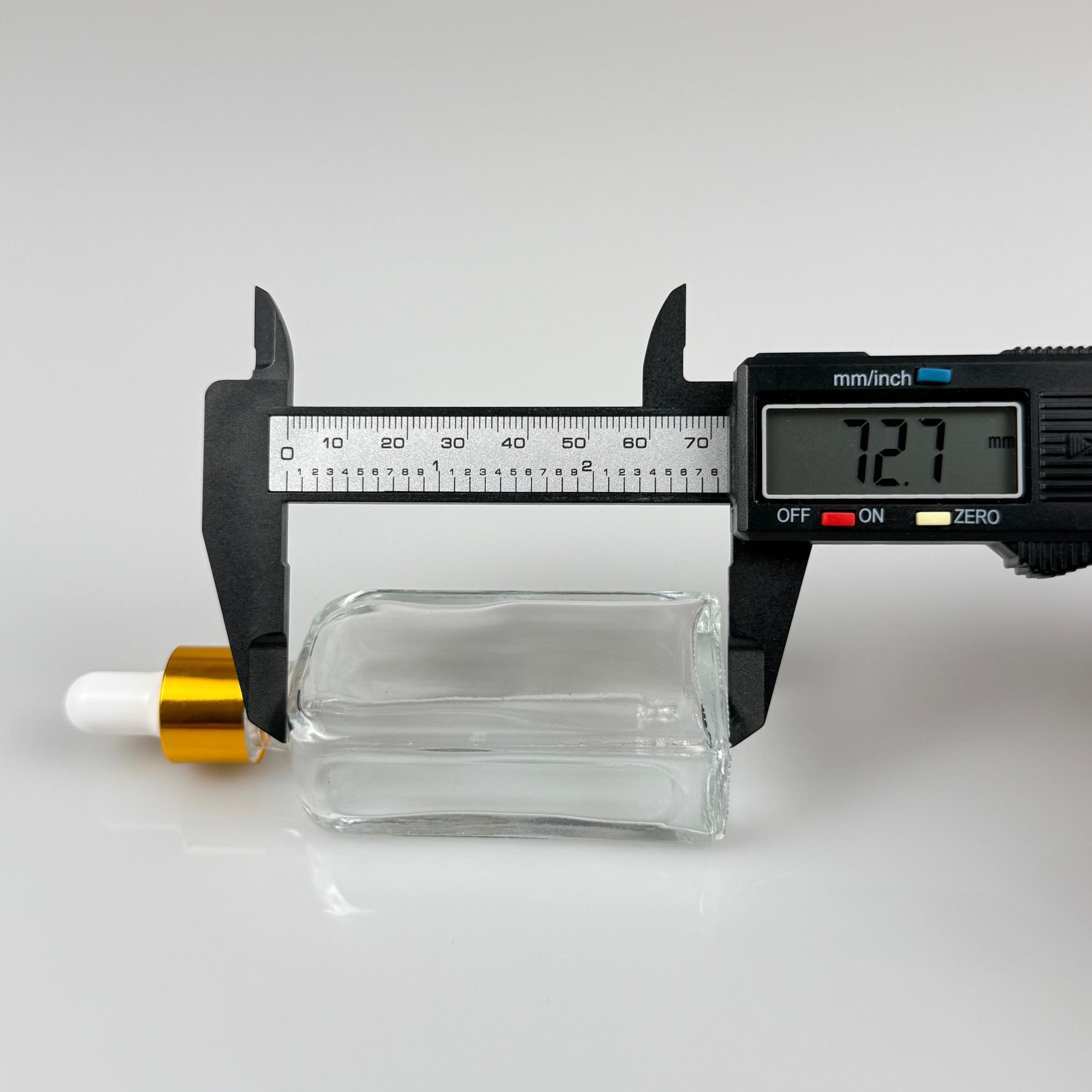 40 CC YASSI DİKDÖRTGEN PRESTİJLİ CAM DAMLALIKLI ŞİŞE - BEYAZ EMZİK - GOLD METALİK KAPAK - 40 ML CAM DAMLALIKLI ŞİŞE - DAMLALIKLI BOŞ ŞİŞE