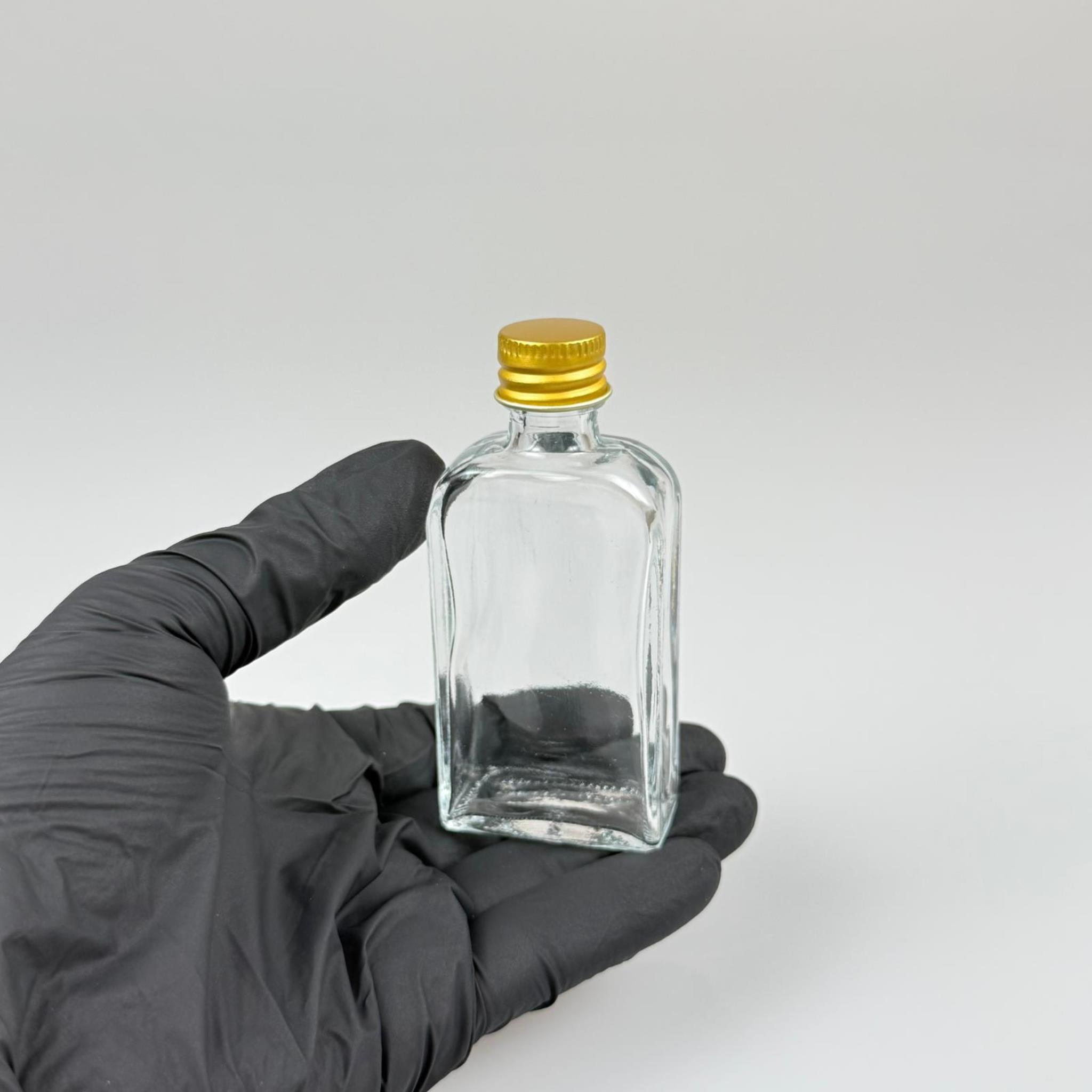 40 CC YASSI DİKDÖRTGEN CAM ŞİŞE - GOLD METAL KAPAKLI KOLONYA TIPALI - 40 ML PRESTİJLİ ŞİŞE