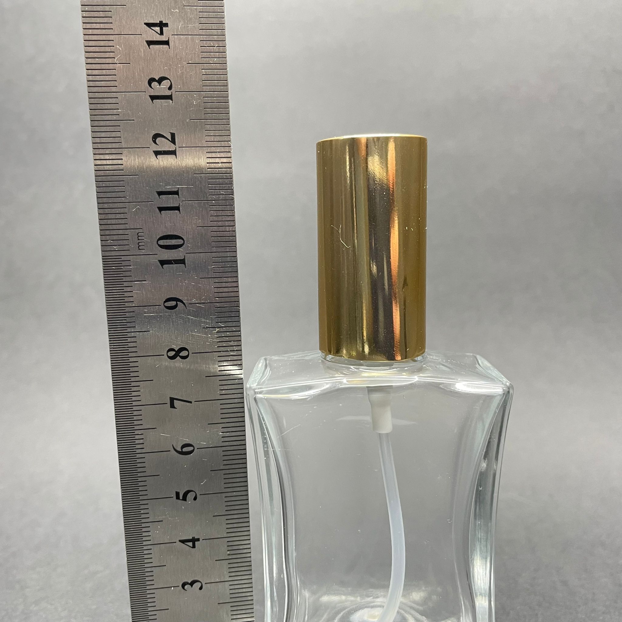 50 CC İNCE BELLİ PARFÜM ŞİŞESİ (DİKDÖRTGEN) GOLD KAPAKLI - SPREYLİ - 50 ML BOŞ PARFÜM ŞİŞESİ - 1. KALİTE İTHAL CAM