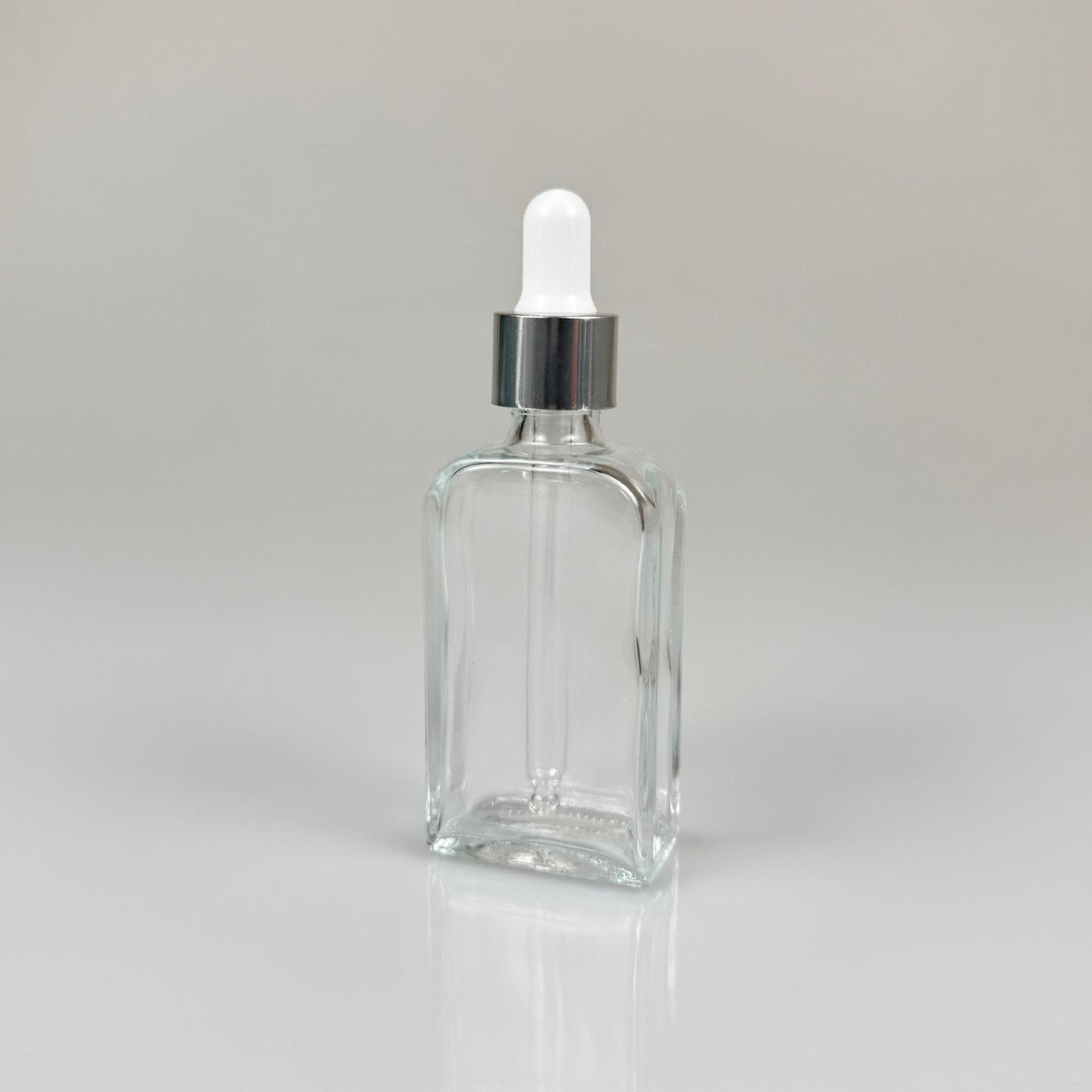 40 CC YASSI DİKDÖRTGEN PRESTİJLİ CAM DAMLALIKLI ŞİŞE - BEYAZ EMZİK - GÜMÜŞ METALİK KAPAK - 40 ML CAM DAMLALIKLI ŞİŞE - DAMLALIKLI BOŞ ŞİŞE