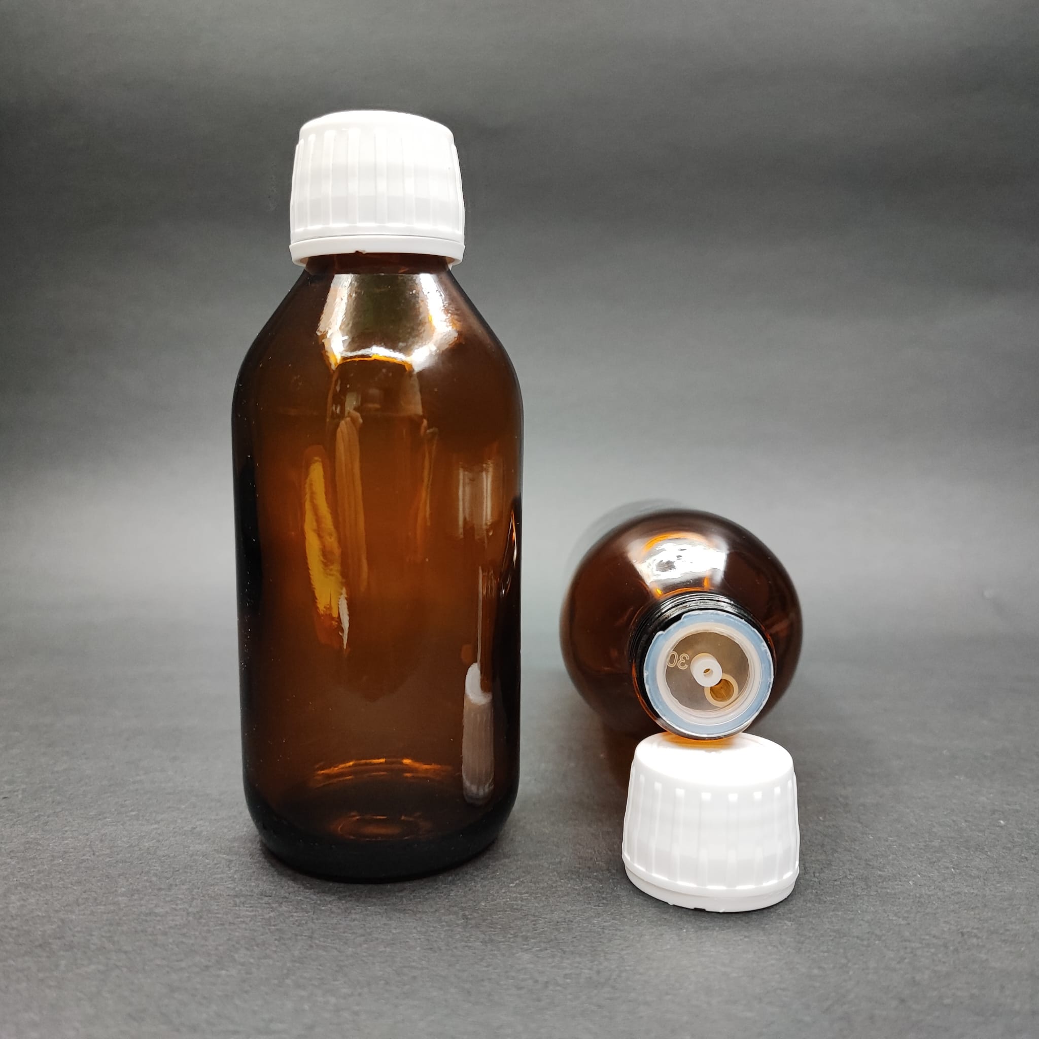 125 ML DOLUMU KOLAY, GENİŞ AĞIZLI İÇTEN DAMLALIKLI ŞİŞE (25 MM AĞIZ)  - 125 CC BEYAZ KİLİTLİ DAMLALIKLI CAM ECZA ŞİŞESİ - AMBER KAHVERENGİ