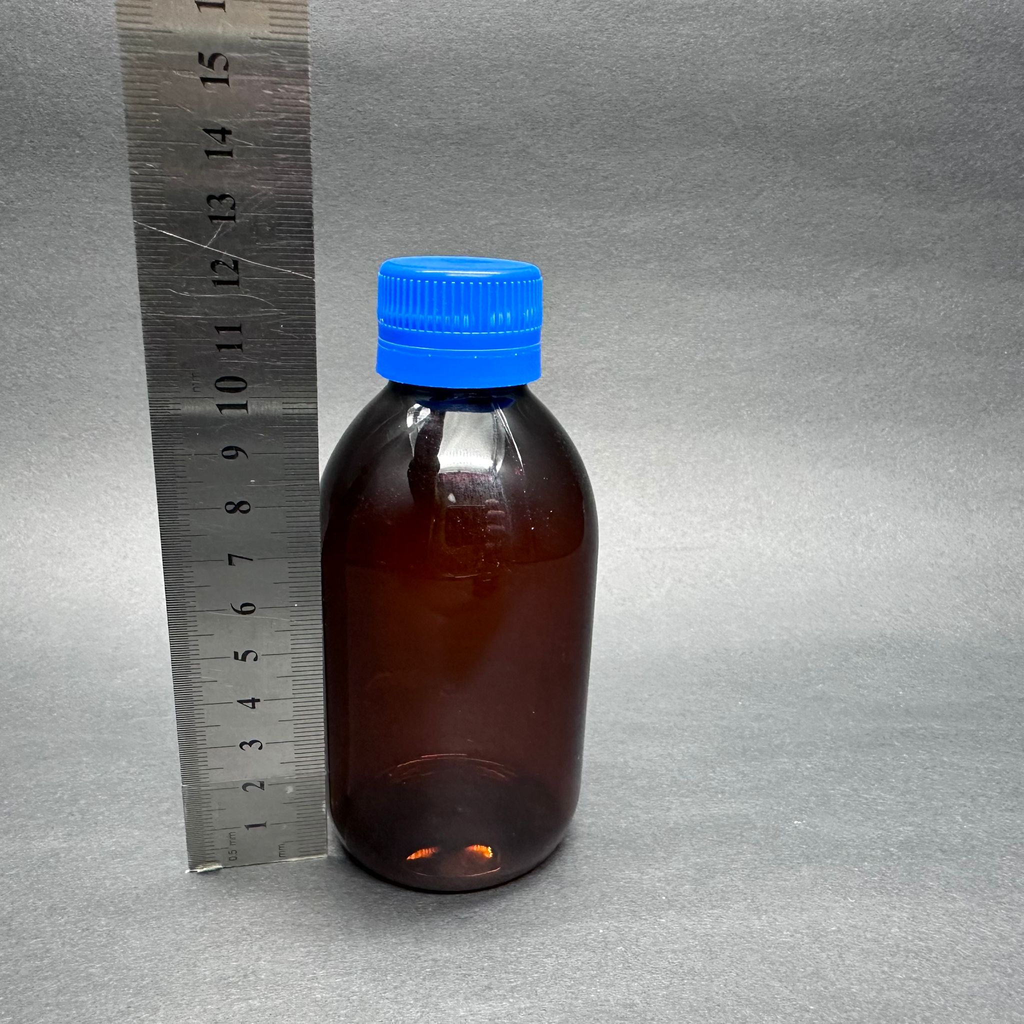 200 CC AMBER PET ECZA ŞİŞESİ - MAVİ KİLİTLİ CONTALI KAPAKLI - 200 ML KAHVERENGİ PLASTİK ŞURUP ŞİŞESİ (21 GR)