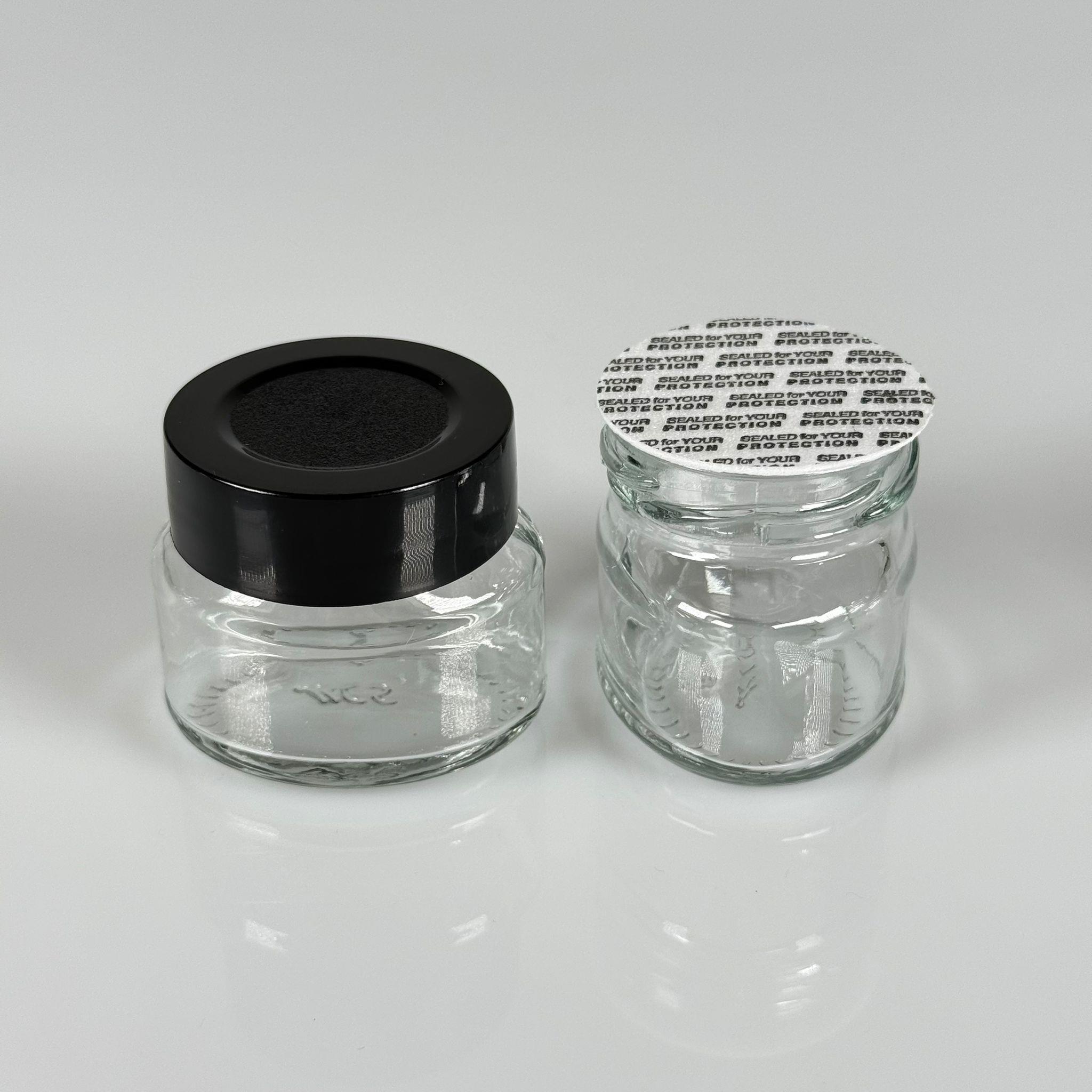 40 CC ELİPS OVAL CAM KAVANOZ - SİYAH PLASTİK DERİN ÜSTÜ KUMLAMA KAPAKLI + KENDİNDEN YAPIŞKANLI KÖPÜK CONTALI - 40 ML MİNİ KREM  CAM KAVANOZLARI