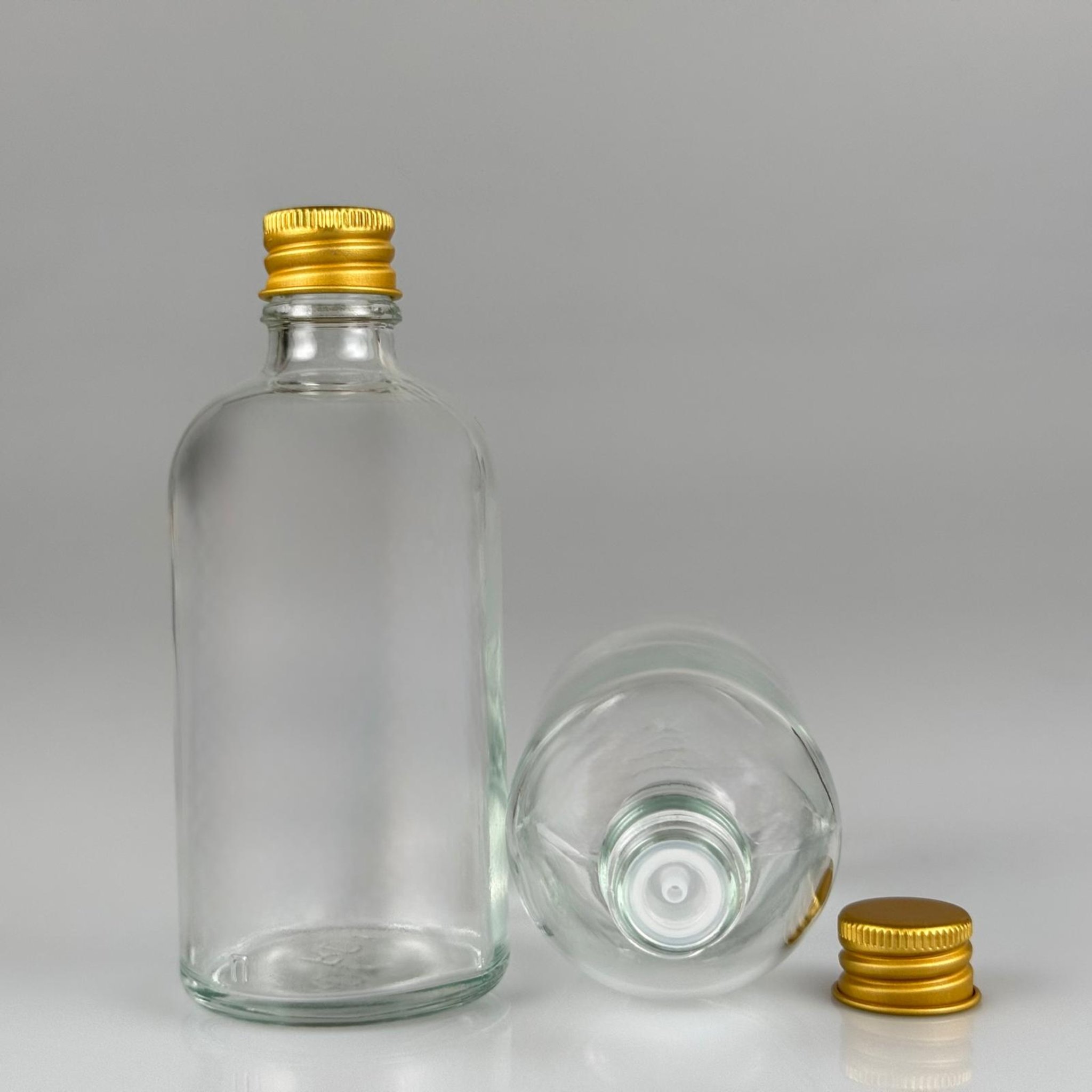 100 CC ŞEFFAF CAM ŞİŞE + KÖPÜK CONTALI GOLD ALÜMİNYUM METAL KAPAKLI + DAMLALIKLI KOLONYA TIPALI TAKIM - 100 ML ŞEFFAF CAM ŞİŞE