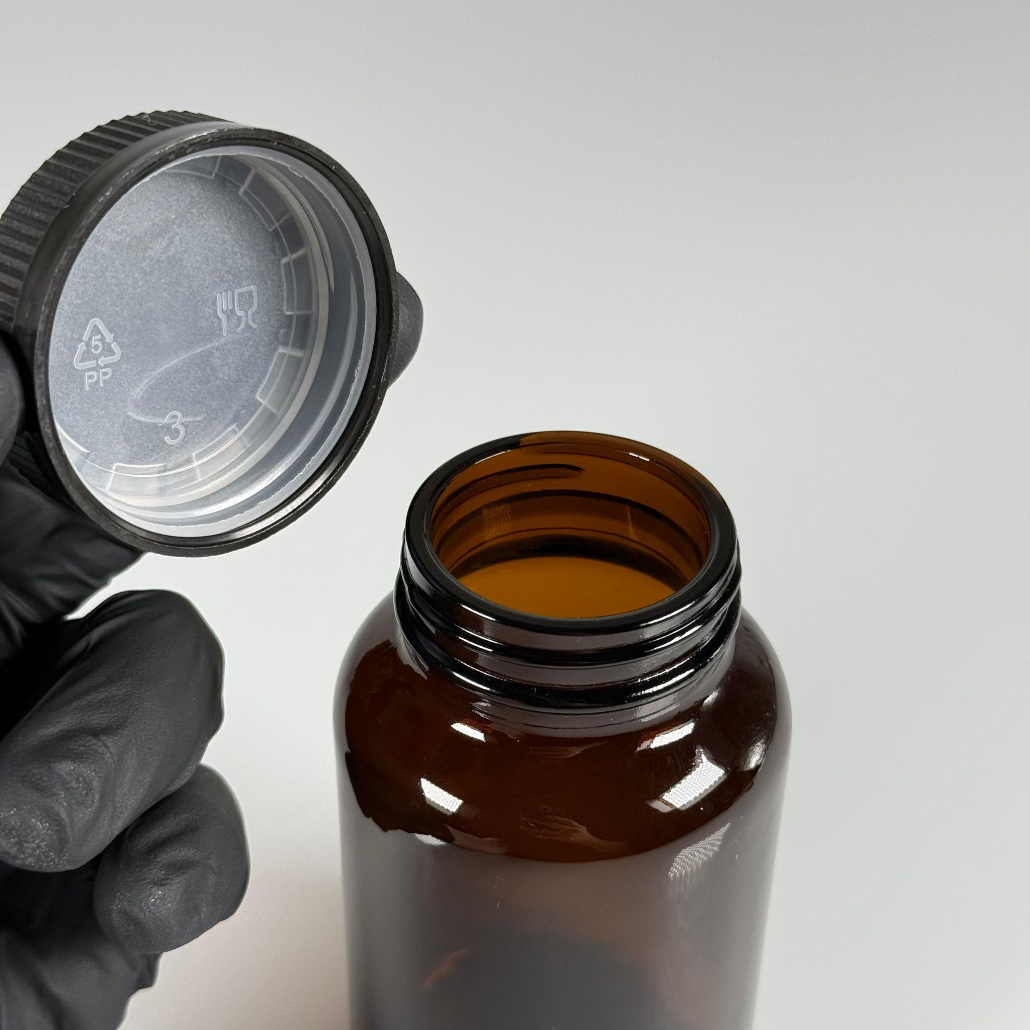 200 CC CAM KAHVERENGİ AMBER TABLET KAPSÜL ŞİŞESİ + 45 MM VİDALI ÇOCUK EMNİYET KİLİTLİ SİYAH PLASTİK KAPAK