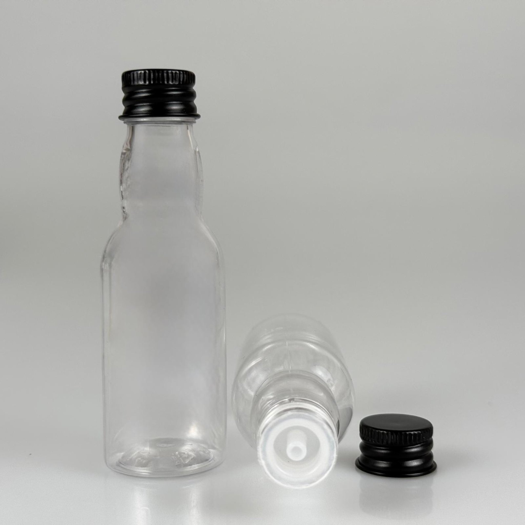 40 CC ŞEFFAF UZUN BOĞAZLI PET ŞİŞE + KÖPÜK CONTALI SİYAH ALÜMİNYUM METAL KAPAKLI + DAMLALIKLI KOLONYA TIPALI TAKIM - 40 ML BOĞAZLI PET ŞİŞE