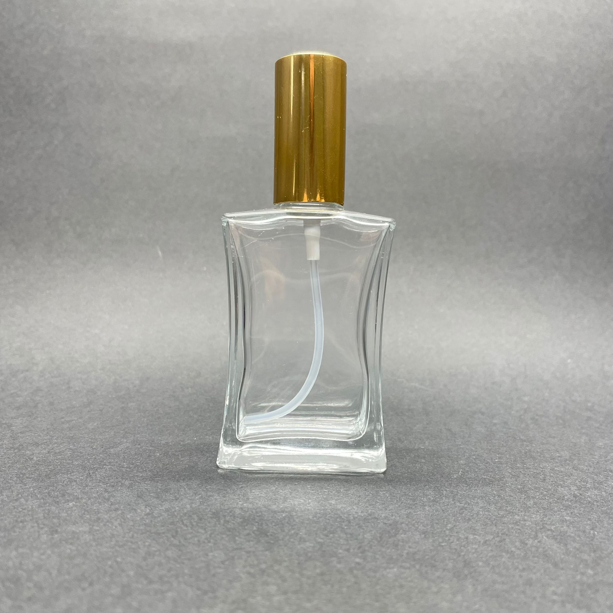 50 CC İNCE BELLİ PARFÜM ŞİŞESİ (DİKDÖRTGEN) GOLD KAPAKLI - SPREYLİ - 50 ML BOŞ PARFÜM ŞİŞESİ - 1. KALİTE İTHAL CAM