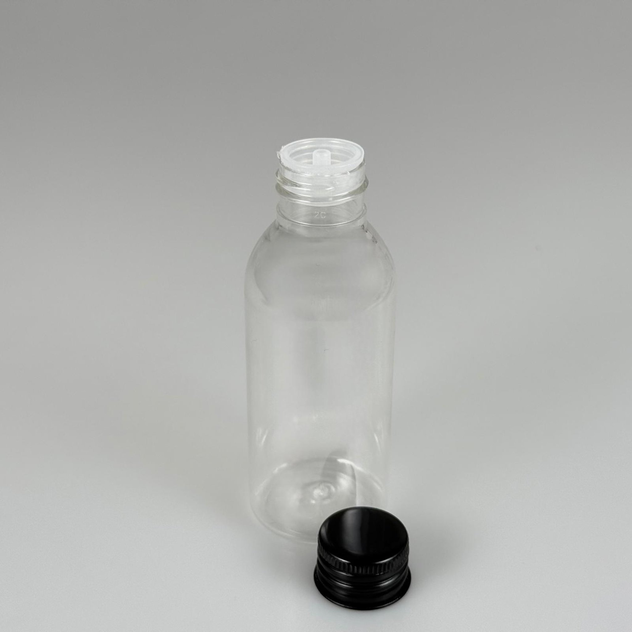 100 CC SİLİNDİR OVAL MODEL ŞEFFAF SERT PET ŞİŞE (24 AĞIZ) + KÖPÜK CONTALI SİYAH METAL ALÜMİNYUM KAPAK + KOLONYA TIPALI TAKIM - 100 ML KAPAKLI KALIN PLASTİK ŞEFFAF ŞİŞELER