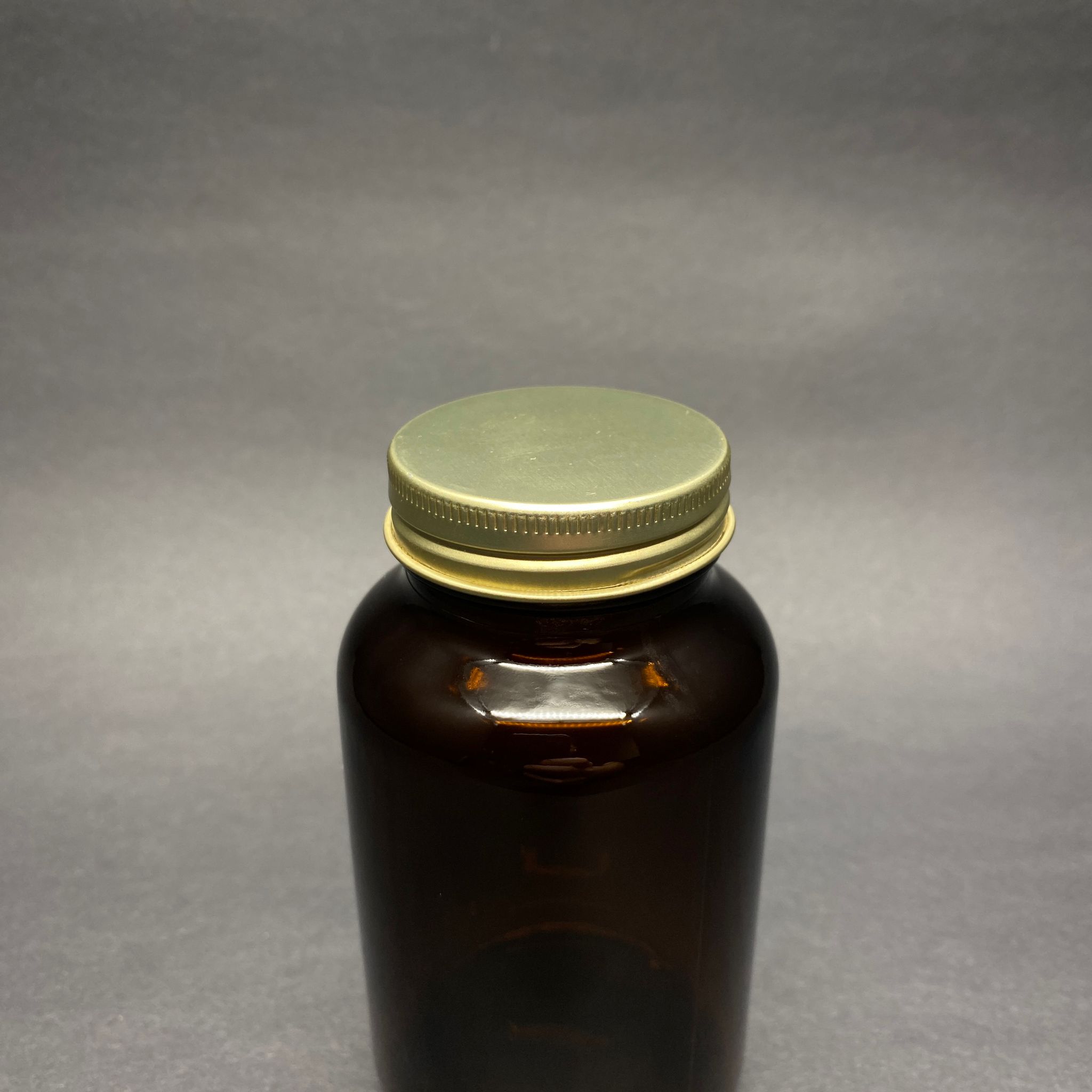 200 CC AMBER CAM TABLET ŞİŞESİ - GOLD CONTALI KAPAKLI İTHAL 200 ML TABLET ŞİŞESİ