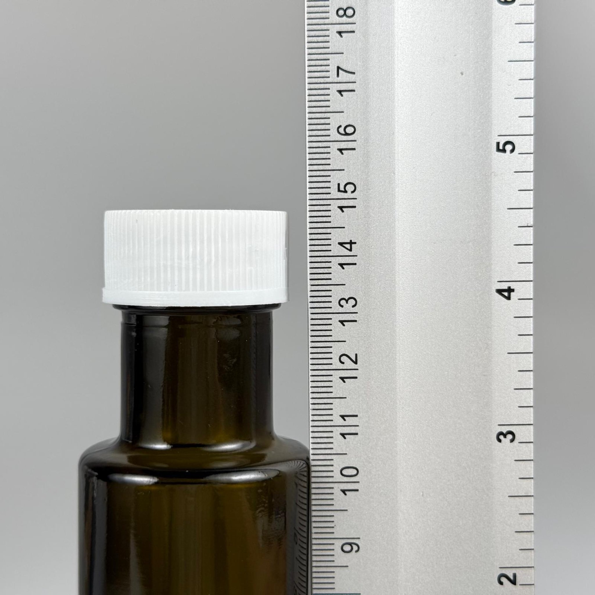 100 CC DORİKA CAM ŞİŞE KOYU YEŞİL (31 MM AĞIZ) - CONTALI BEYAZ KAPAKLI - 100 ML SİLİNDİR DORİCA YAĞ VE SOS ŞİŞELERİ