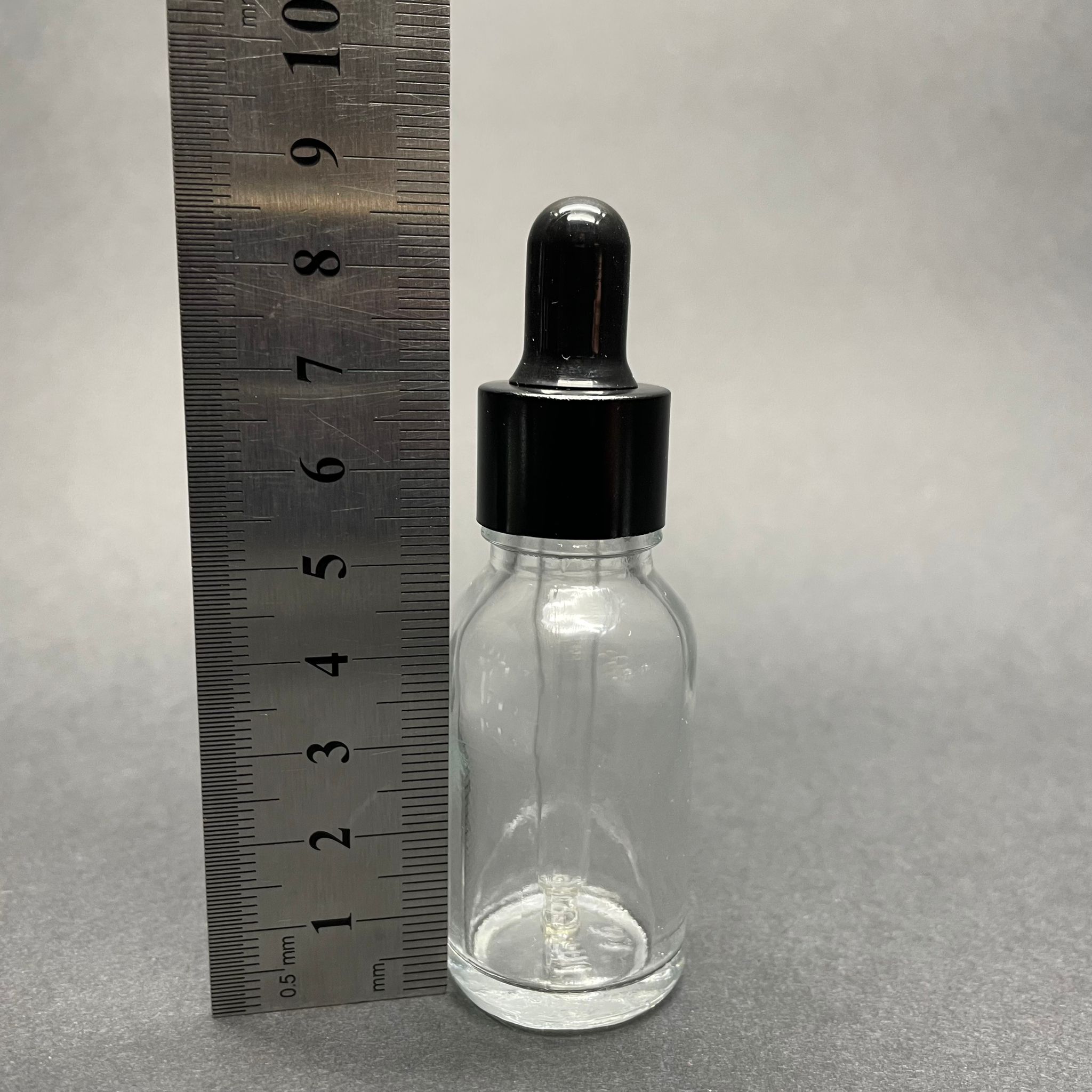 15 CC ŞEFFAF CAM DAMLALIKLI ŞİŞE - SİYAH EMZİK - SİYAH METALİK KAPAK - 15 ML CAM DAMLALIKLI ŞİŞE
