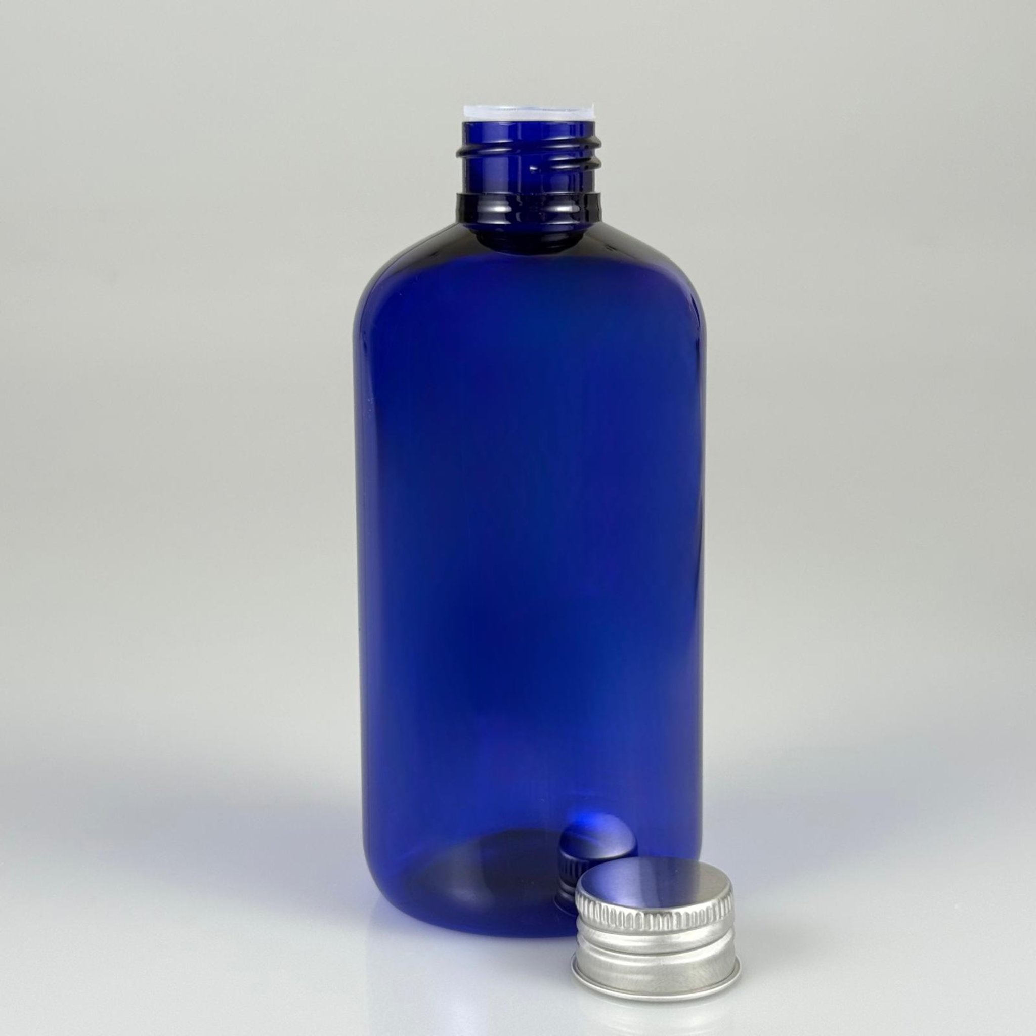 250 CC MAVİ PLASTİK ŞİŞE ZEYNEP MODEL ( 24 AĞIZ ) + KÖPÜK CONTALI GÜMÜŞ METAL ALÜMİNYUM KAPAKLI + KOLONYA TIPALI TAKIM - 250 ML KAPAKLI MAVİ TOMBUL PET ŞİŞELER