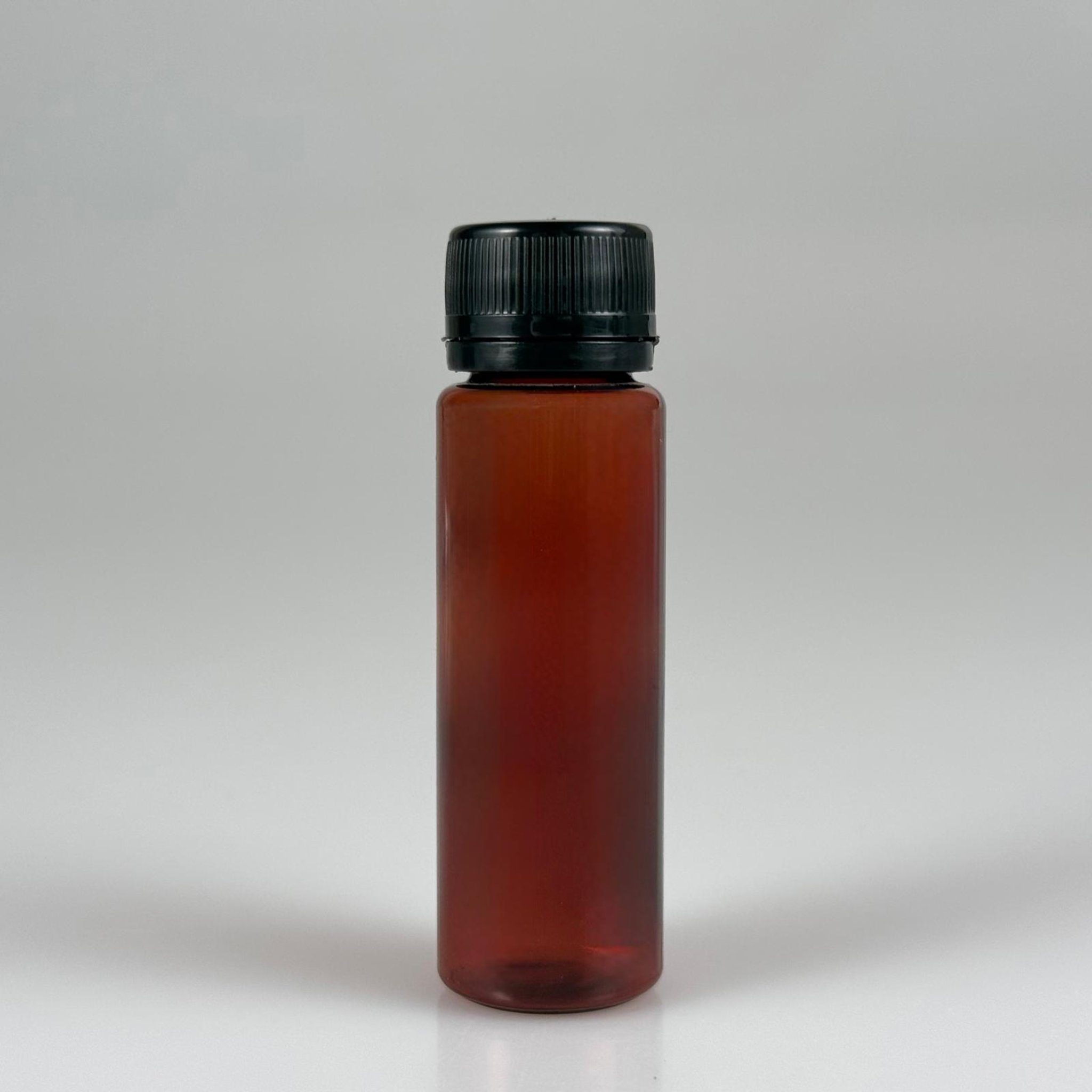 20 CC PET SHOT ŞİŞESİ  - KİLİTLİ SİYAH KAPAKLI KOLAJEN ŞİŞESİ - 20 ML PLASTİK ŞİŞE - AMBER (KİLİTLİ KAPAK SERTÇE BASTIRARAK KAPANIR)
