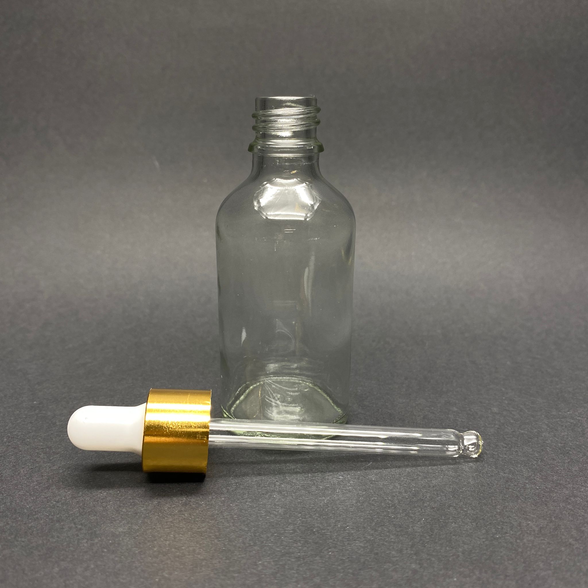 50 CC ŞEFFAF CAM DAMLALIKLI ŞİŞE - BEYAZ EMZİK - GOLD METALİK KAPAK - 50 ML SAYDAM CAM DAMLALIKLI ŞİŞE