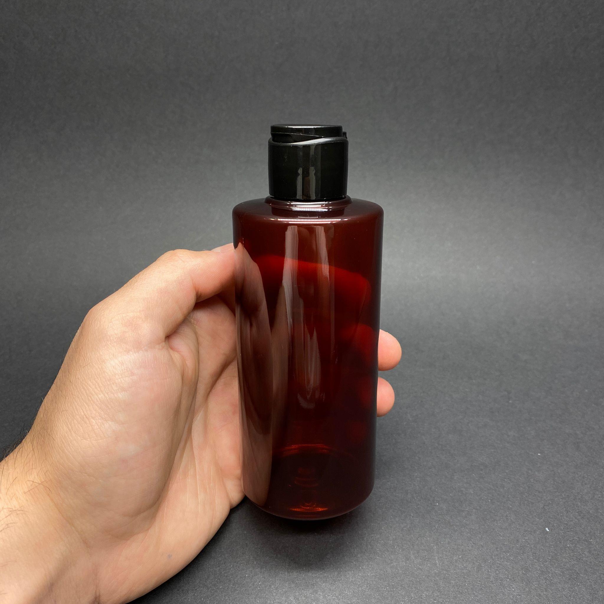 200 CC SİLİNDİR KESKİN KÜT MODEL SERT (25 GR) PET ŞİŞE - SİYAH FARMASİ MODEL FLİPTOP KAPAKLI - AĞIZ ÇAPI 24 MM - AMBER