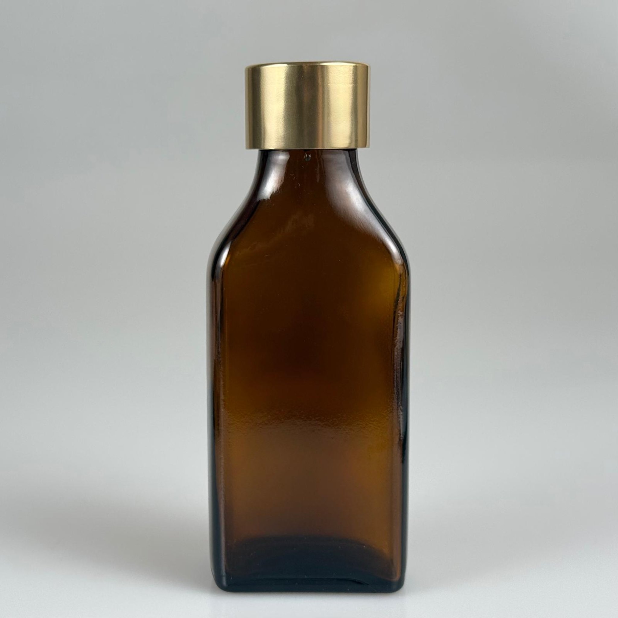 100 CC AMBER YASSI CAM ŞİŞE + ALÜMİNYUM KAPLAMALI GOLD KAPAKLKI TAKIM - 100 ML KAYVERENGİ CAM ŞİŞE