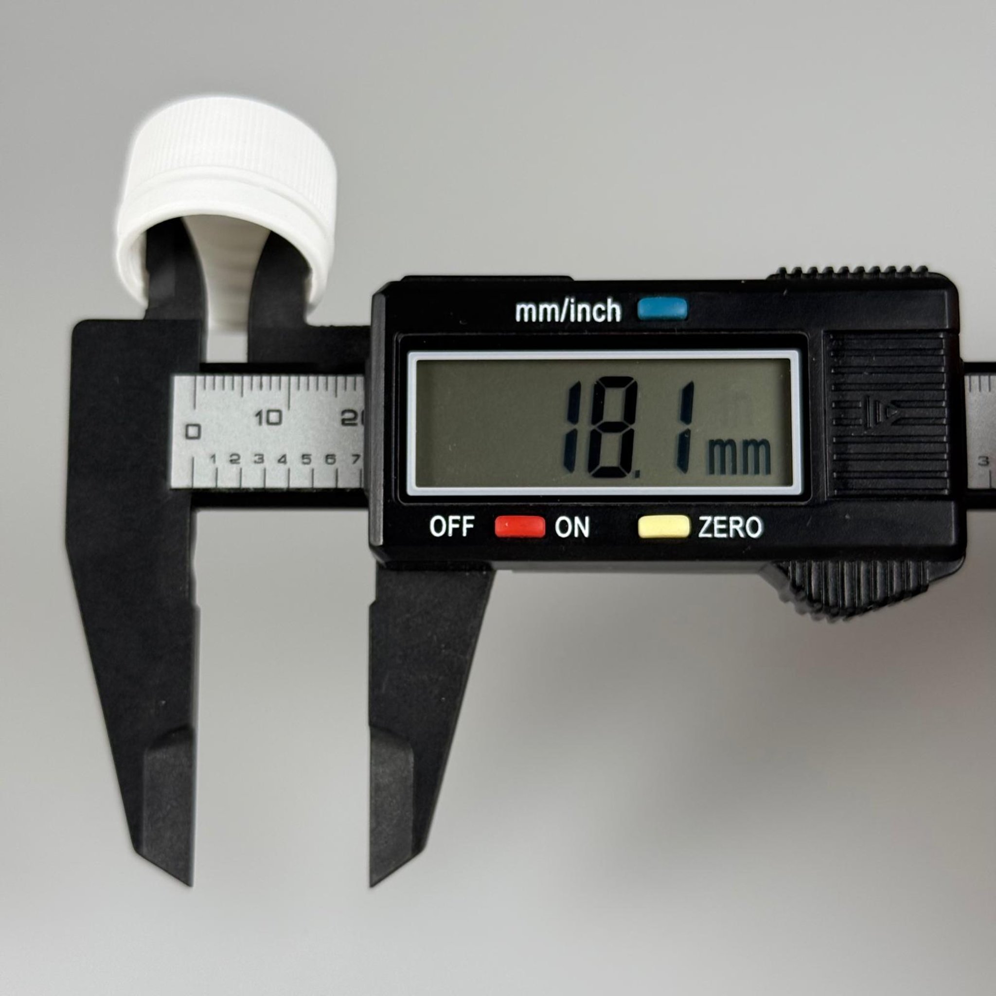 20 MM KİLİTLİ KAPAK BEYAZ (PET SHOT ŞİŞESİ İÇİN)
